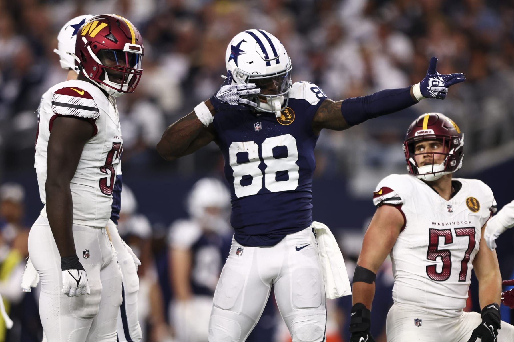 ARLINGTON, TX - NOVEMBER 23: CeeDee Lamb #88 of the Dallas Cowboys signals for a first down after a play during the second quarter of an NFL football game against the Washington Commanders at AT&T Stadium on November 23, 2023 in Arlington, Texas. (Photo by Kevin Sabitus/Getty Images)