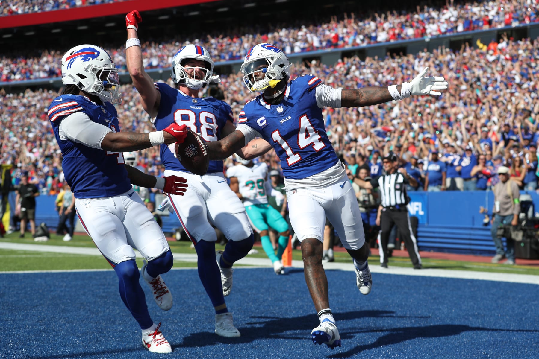ORCHARD PARK, NEW YORK - OCTOBER 01: Stefon Diggs #14 of the Buffalo Bills celebrates his touchdown reception against the Miami Dolphins during the second quarter at Highmark Stadium on October 01, 2023 in Orchard Park, New York. (Photo by Bryan M. Bennett/Getty Images)