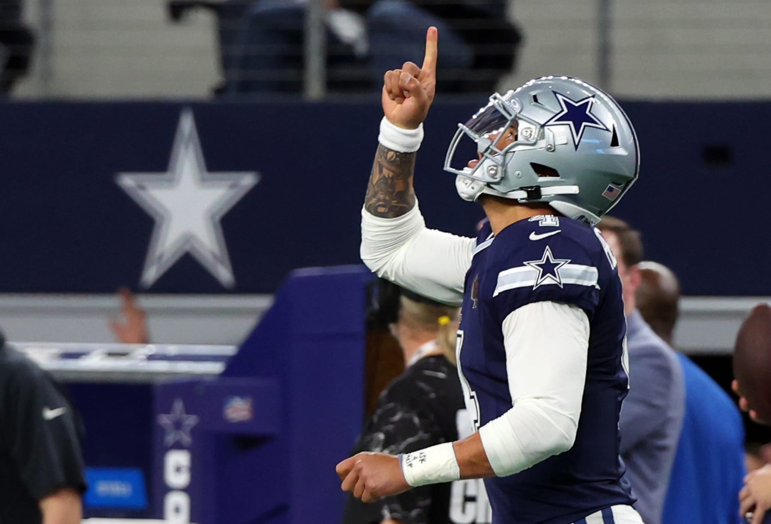 ARLINGTON, TEXAS - DECEMBER 30: Quarterback Dak Prescott #4 of the Dallas Cowboys celebrates after a touchdown against the Detroit Lions at AT&T Stadium on December 30, 2023 in Arlington, Texas. (Photo by Richard Rodriguez/Getty Images)