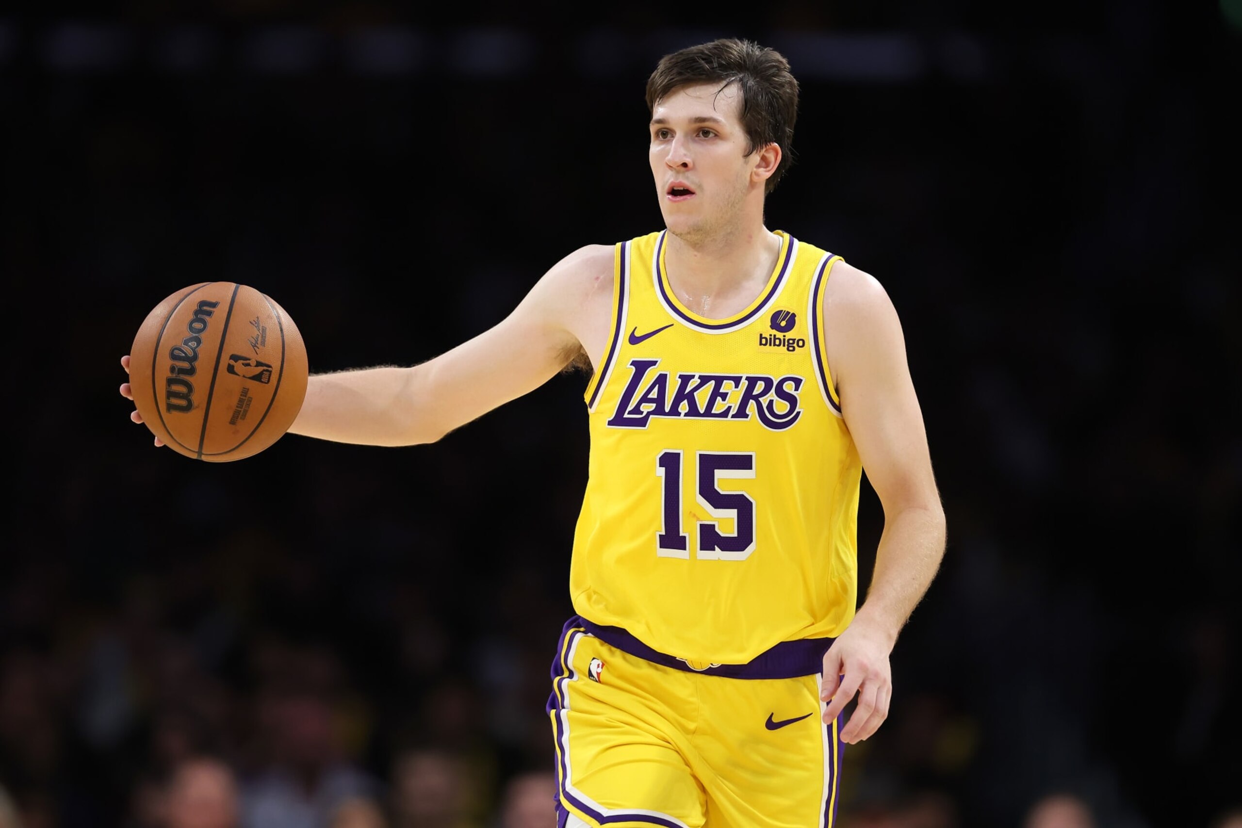 LOS ANGELES, CALIFORNIA - DECEMBER 28: Austin Reaves #15 of the Los Angeles Lakers dribbles up court during the second half of a game against the Charlotte Hornets at Crypto.com Arena on December 28, 2023 in Los Angeles, California. NOTE TO USER: User expressly acknowledges and agrees that, by downloading and or using this photograph, User is consenting to the terms and conditions of the Getty Images License Agreement.  (Photo by Sean M. Haffey/Getty Images)