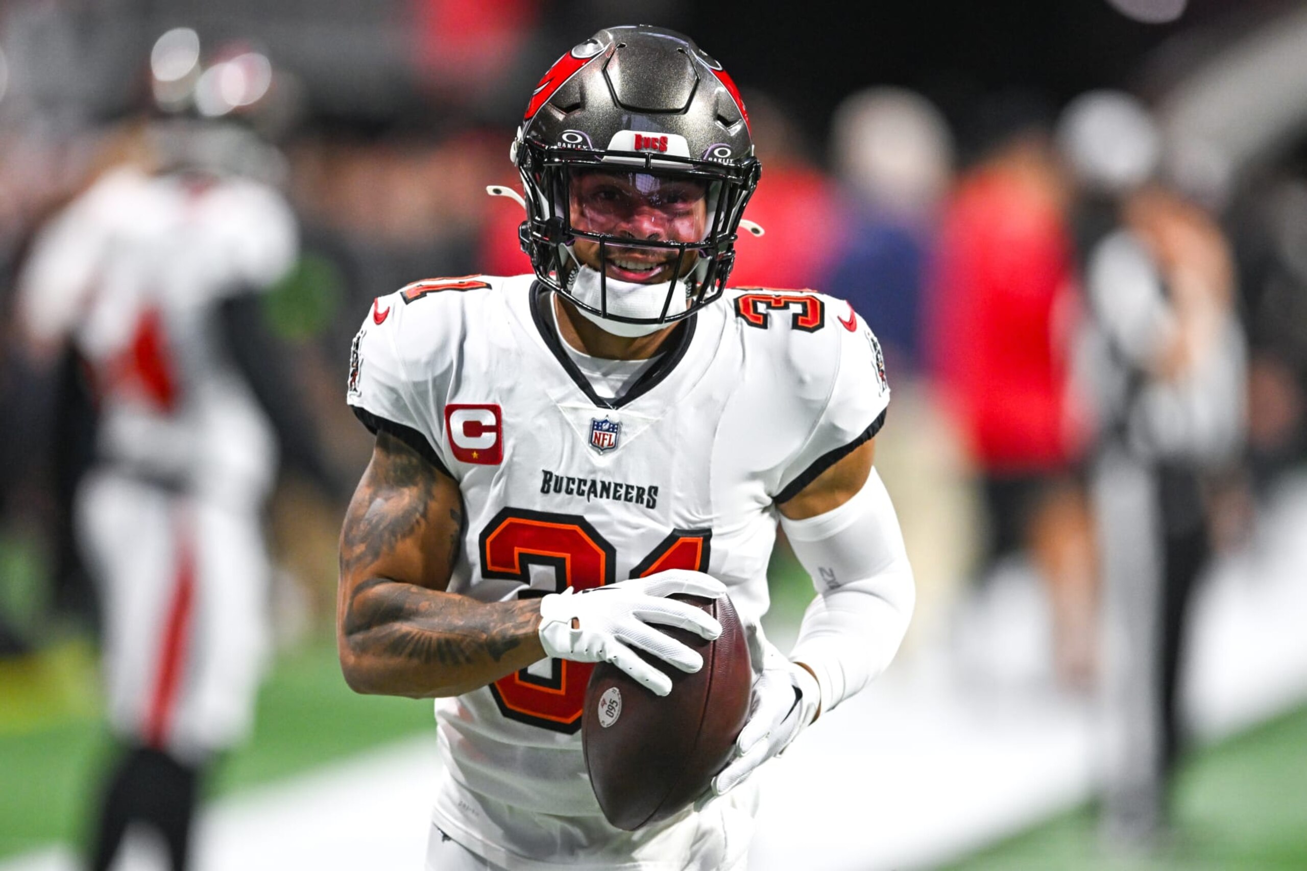 ATLANTA, GA  DECEMBER 10:  Tampa Bay safety Antoine Winfield Jr. (31) warms up prior to the start of the NFL game between the Tampa Bay Buccaneers and the Atlanta Falcons on December 10th, 2023 at Mercedes-Benz Stadium in Atlanta, GA.  (Photo by Rich von Biberstein/Icon Sportswire via Getty Images)
