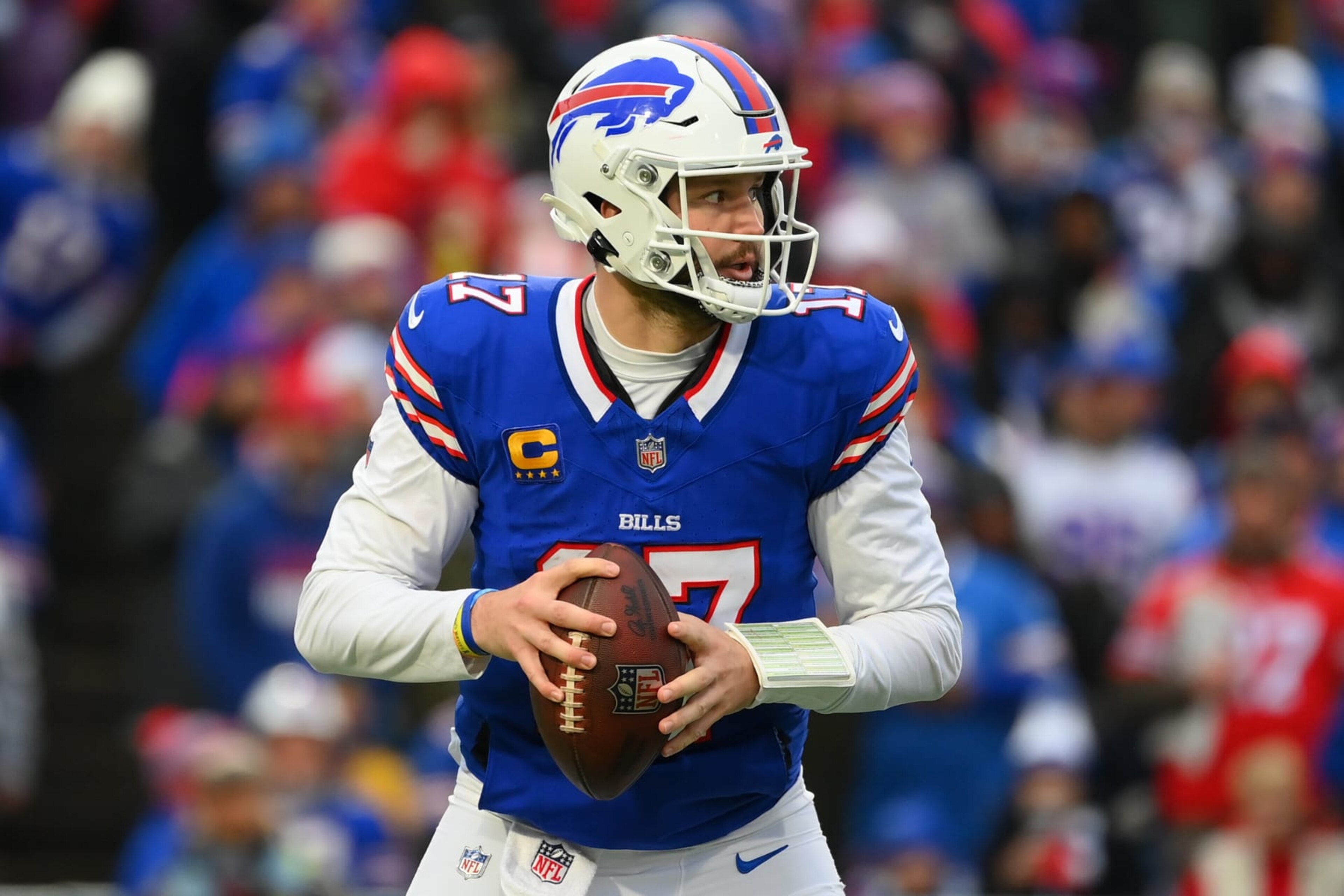 ORCHARD PARK, NEW YORK - DECEMBER 31: Josh Allen #17 of the Buffalo Bills drops back to pass against the New England Patriots during the first half at Highmark Stadium on December 31, 2023 in Orchard Park, New York. The Bills won 27-21. (Photo by Rich Barnes/Getty Images) ORCHARD PARK, NEW YORK - DECEMBER 31: Josh Allen #17 of the Buffalo Bills drops back to pass against the New England Patriots during the first half at Highmark Stadium on December 31, 2023 in Orchard Park, New York. The Bills won 27-21. (Photo by Rich Barnes/Getty Images)