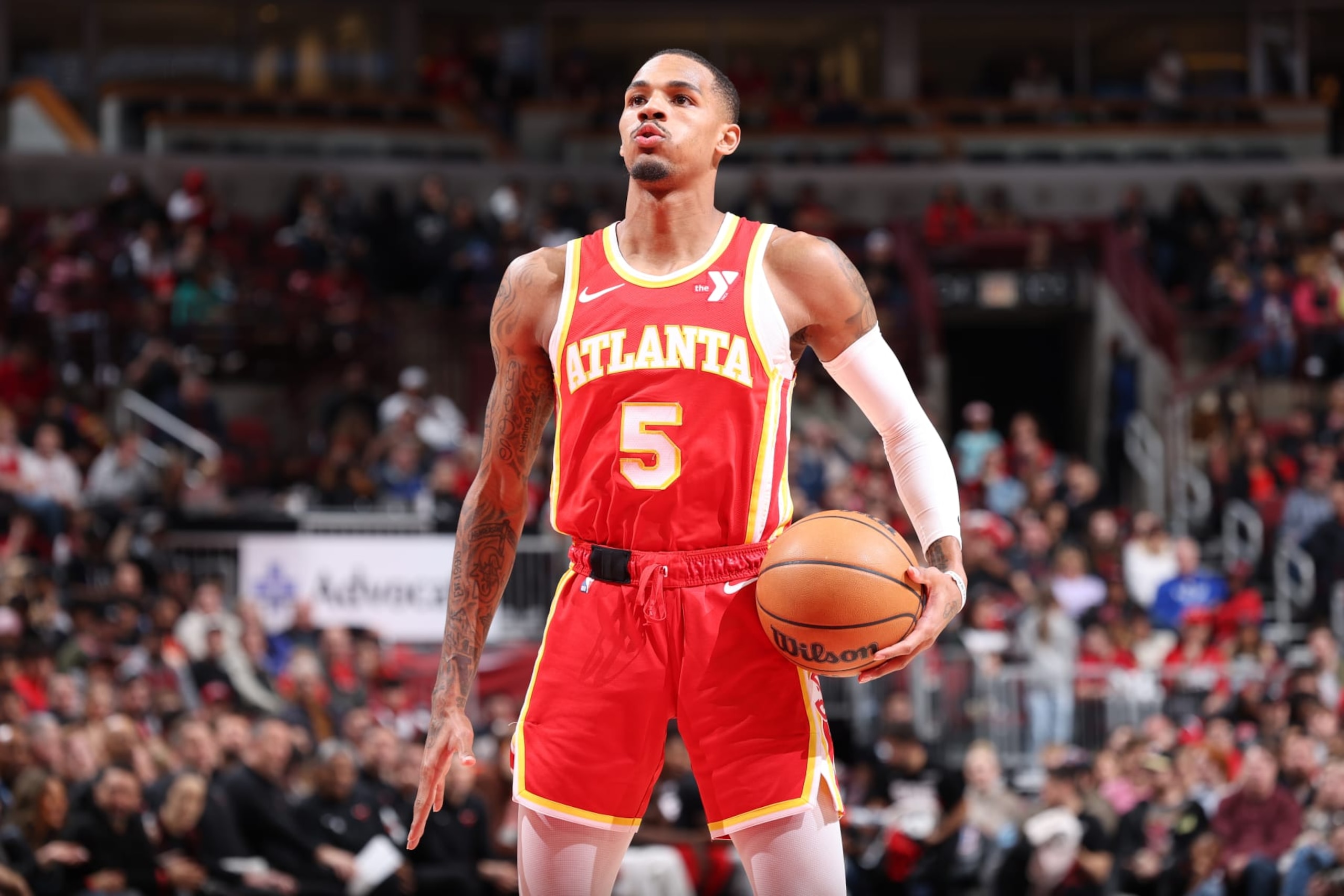 CHICAGO, IL - DECEMBER 26: Dejounte Murray #5 of the Atlanta Hawks prepares to shoot a free throw during the game against the Chicago Bulls on December 26, 2023 at United Center in Chicago, Illinois. NOTE TO USER: User expressly acknowledges and agrees that, by downloading and or using this photograph, User is consenting to the terms and conditions of the Getty Images License Agreement. Mandatory Copyright Notice: Copyright 2023 NBAE (Photo by Jeff Haynes/NBAE via Getty Images) CHICAGO, IL - DECEMBER 26: Dejounte Murray #5 of the Atlanta Hawks prepares to shoot a free throw during the game against the Chicago Bulls on December 26, 2023 at United Center in Chicago, Illinois. NOTE TO USER: User expressly acknowledges and agrees that, by downloading and or using this photograph, User is consenting to the terms and conditions of the Getty Images License Agreement. Mandatory Copyright Notice: Copyright 2023 NBAE (Photo by Jeff Haynes/NBAE via Getty Images)