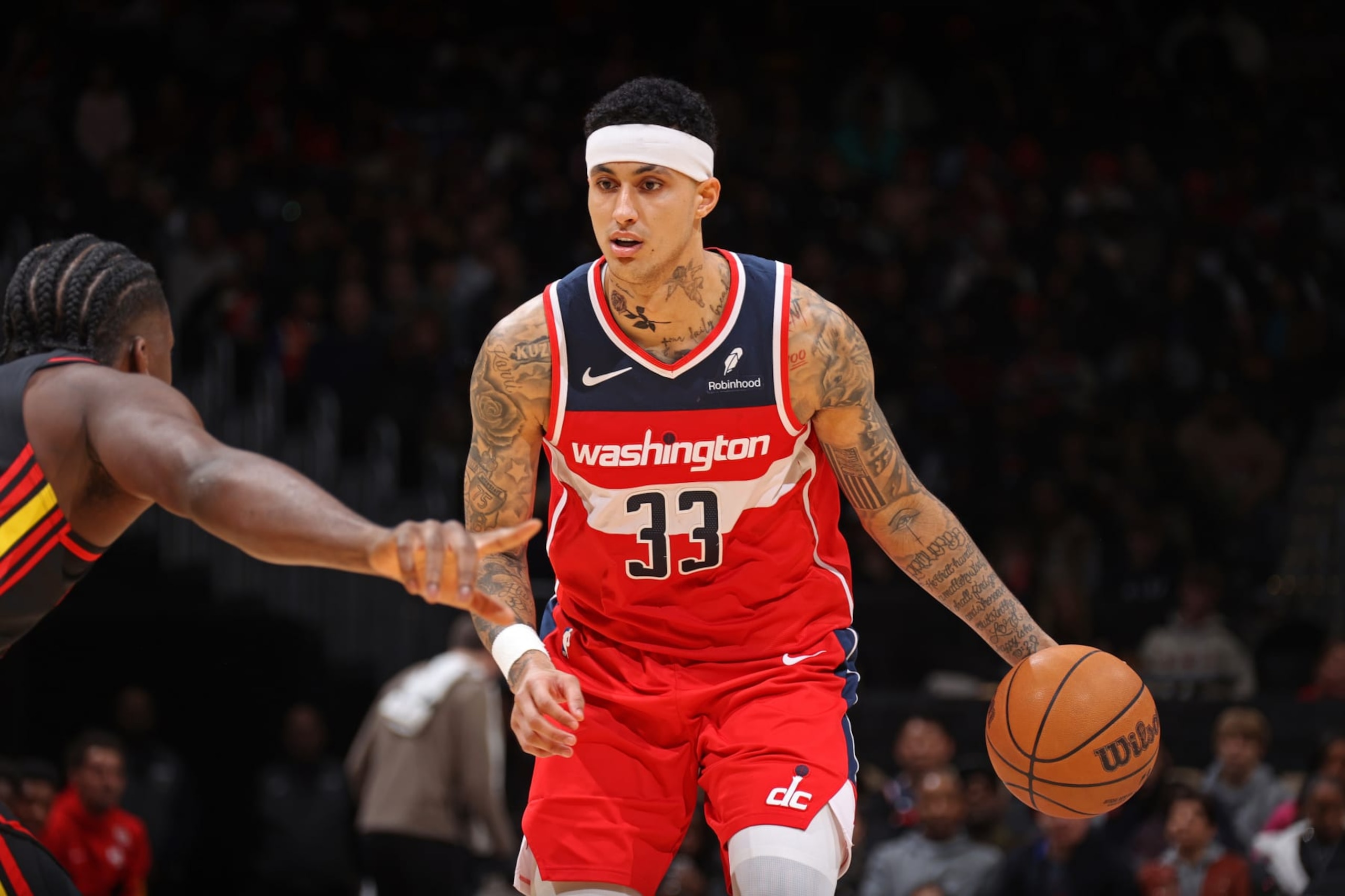WASHINGTON, DC - DECEMBER 31: Kyle Kuzma #33 of the Washington Wizards dribbles the ball during the game against the Atlanta Hawks on December 31, 2023 at Capital One Arena in Washington, DC. NOTE TO USER: User expressly acknowledges and agrees that, by downloading and or using this Photograph, user is consenting to the terms and conditions of the Getty Images License Agreement. Mandatory Copyright Notice: Copyright 2023 NBAE (Photo by Stephen Gosling/NBAE via Getty Images) WASHINGTON, DC - DECEMBER 31: Kyle Kuzma #33 of the Washington Wizards dribbles the ball during the game against the Atlanta Hawks on December 31, 2023 at Capital One Arena in Washington, DC. NOTE TO USER: User expressly acknowledges and agrees that, by downloading and or using this Photograph, user is consenting to the terms and conditions of the Getty Images License Agreement. Mandatory Copyright Notice: Copyright 2023 NBAE (Photo by Stephen Gosling/NBAE via Getty Images)
