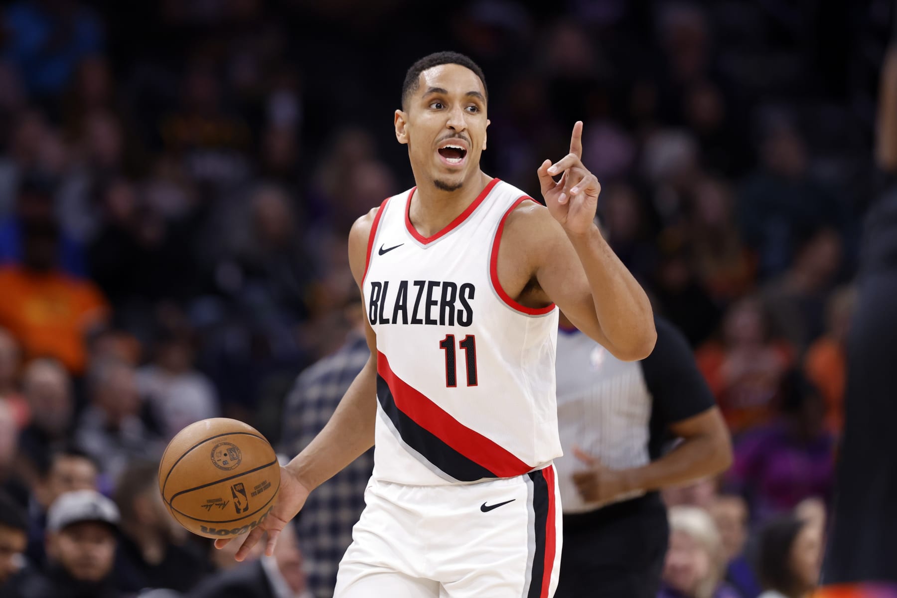 PHOENIX, ARIZONA - JANUARY 01: Malcolm Brogdon #11 of the Portland Trail Blazers in action during the game against the Phoenix Suns at Footprint Center on January 01, 2024 in Phoenix, Arizona. The Suns defeated the Trail Blazers 109-88. NOTE TO USER: User expressly acknowledges and agrees that, by downloading and or using this photograph, User is consenting to the terms and conditions of the Getty Images License Agreement.  (Photo by Chris Coduto/Getty Images)