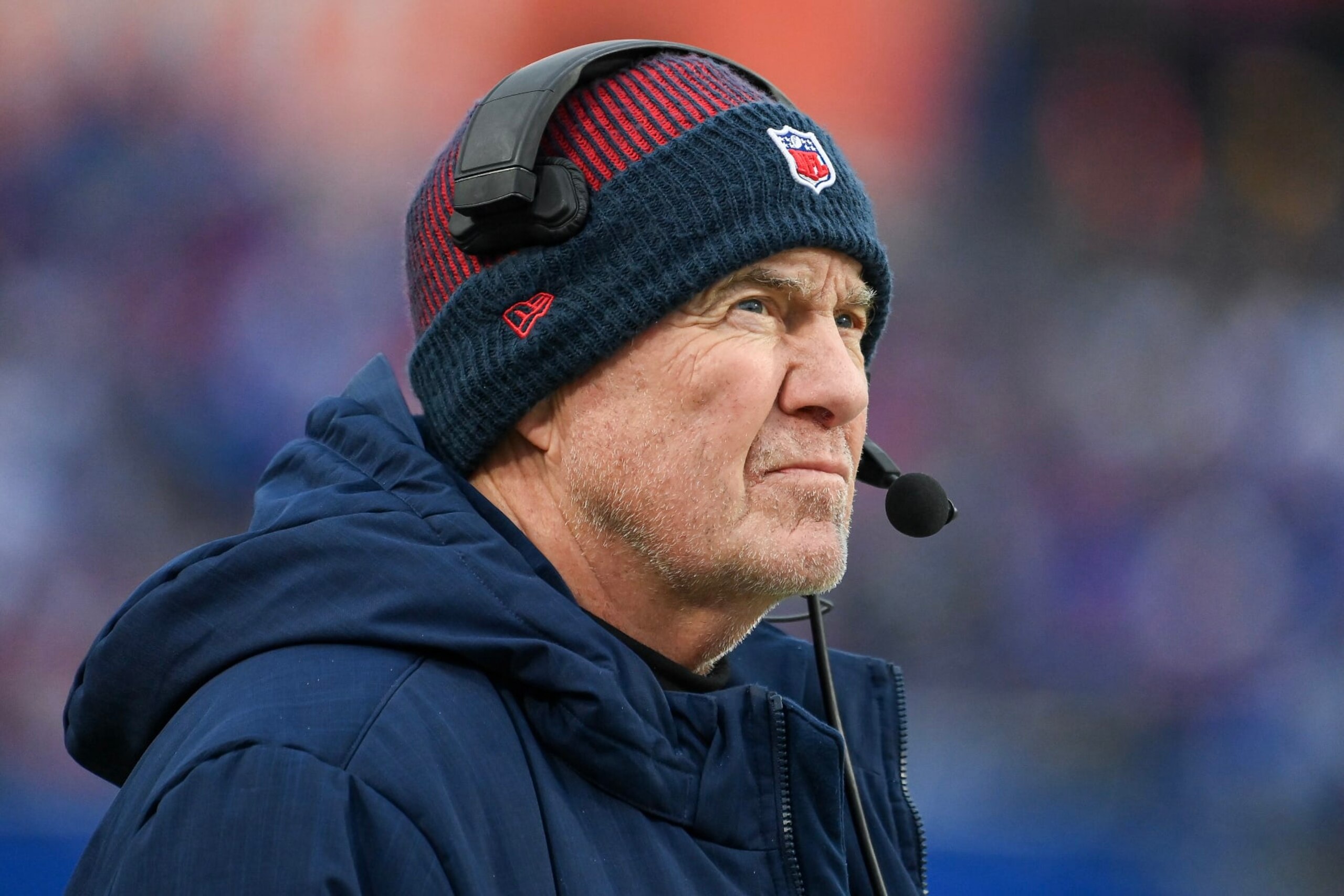 ORCHARD PARK, NEW YORK - DECEMBER 31: Head coach Bill Belichick of the New England Patriots looks on during the first half of a game against the Buffalo Bills at Highmark Stadium on December 31, 2023 in Orchard Park, New York. (Photo by Rich Barnes/Getty Images)