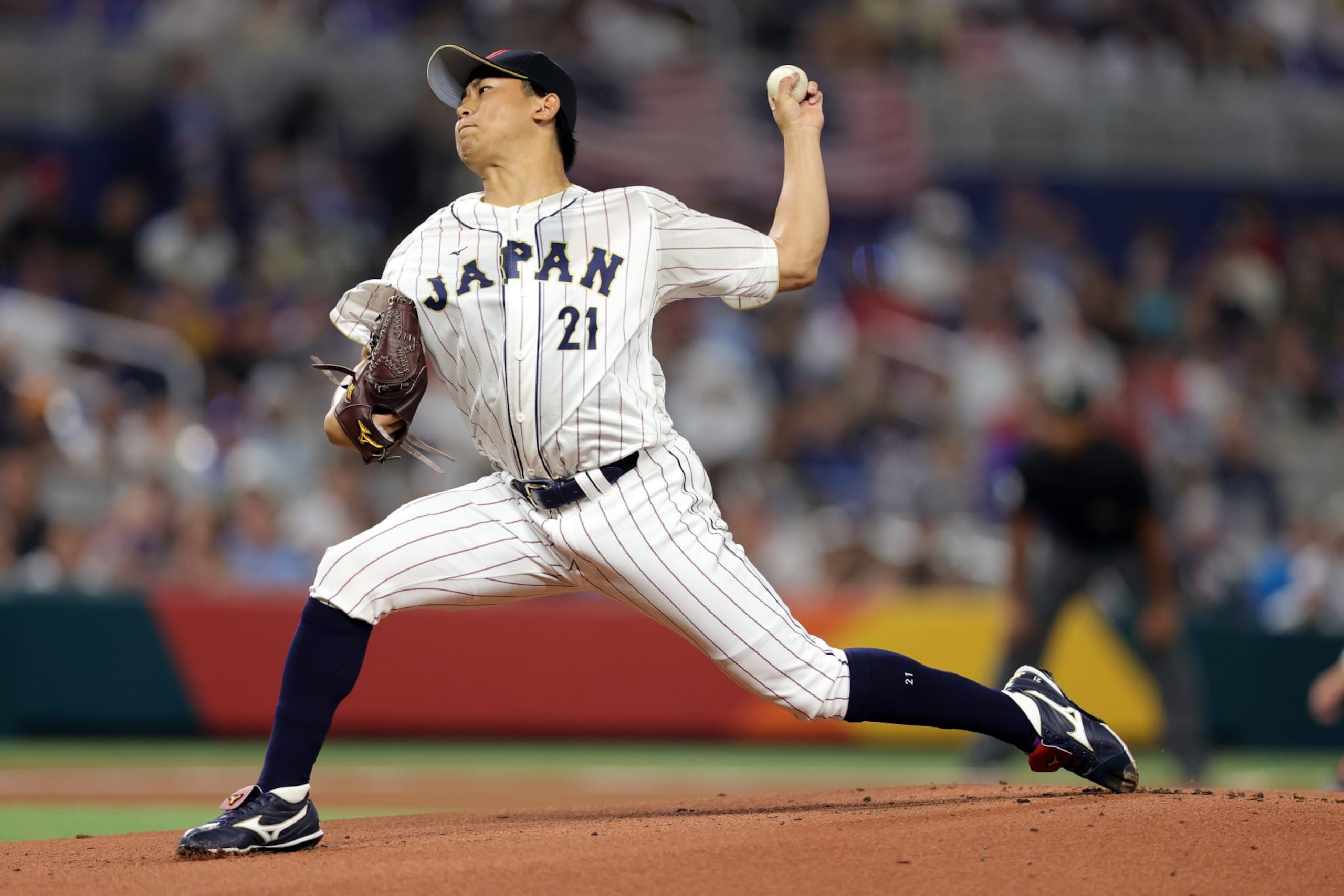 MIAMI, FLORIDA - MARCH 21: Shota Imanaga #21 of Team Japan pitches in the first inning against Team USA during the World Baseball Classic Championship at loanDepot park on March 21, 2023 in Miami, Florida. (Photo by Megan Briggs/Getty Images)