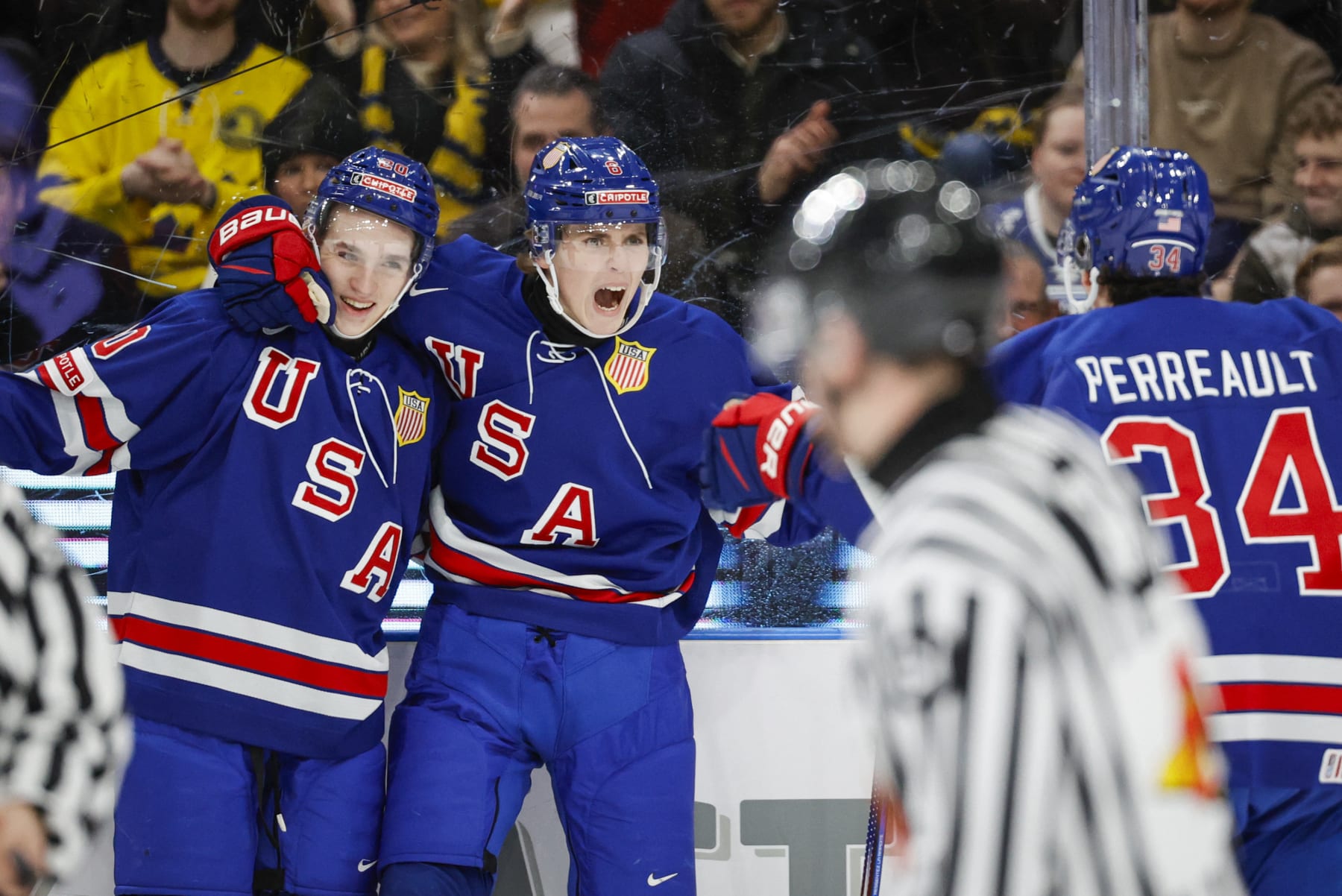 USA's forward Will Smith celebrates with teammates scoring during the semi-final match between USA and Finland of the IIHF World Junior Championship in Gothenburg, Sweden on January 4, 2024. (Photo by Adam Ihse/TT / various sources / AFP) / Sweden OUT (Photo by ADAM IHSE/TT/TT News Agency/TT NYHETSBYRÅN/AFP via Getty Images)