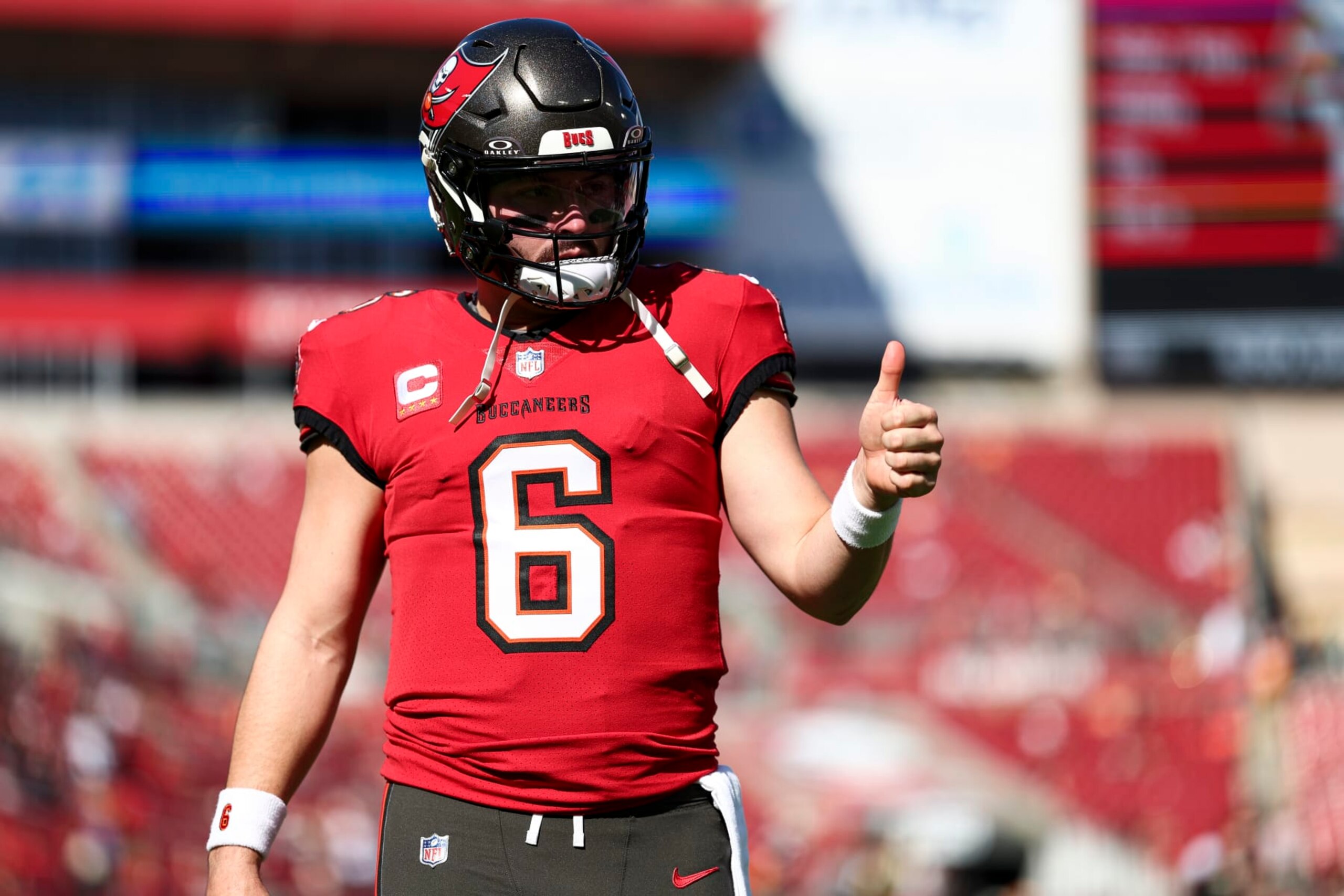 TAMPA, FL - DECEMBER 31: Baker Mayfield #6 of the Tampa Bay Buccaneers signals a thumbs-up prior to an NFL football game against the New Orleans Saints at Raymond James Stadium on December 31, 2023 in Tampa, Florida. (Photo by Kevin Sabitus/Getty Images)