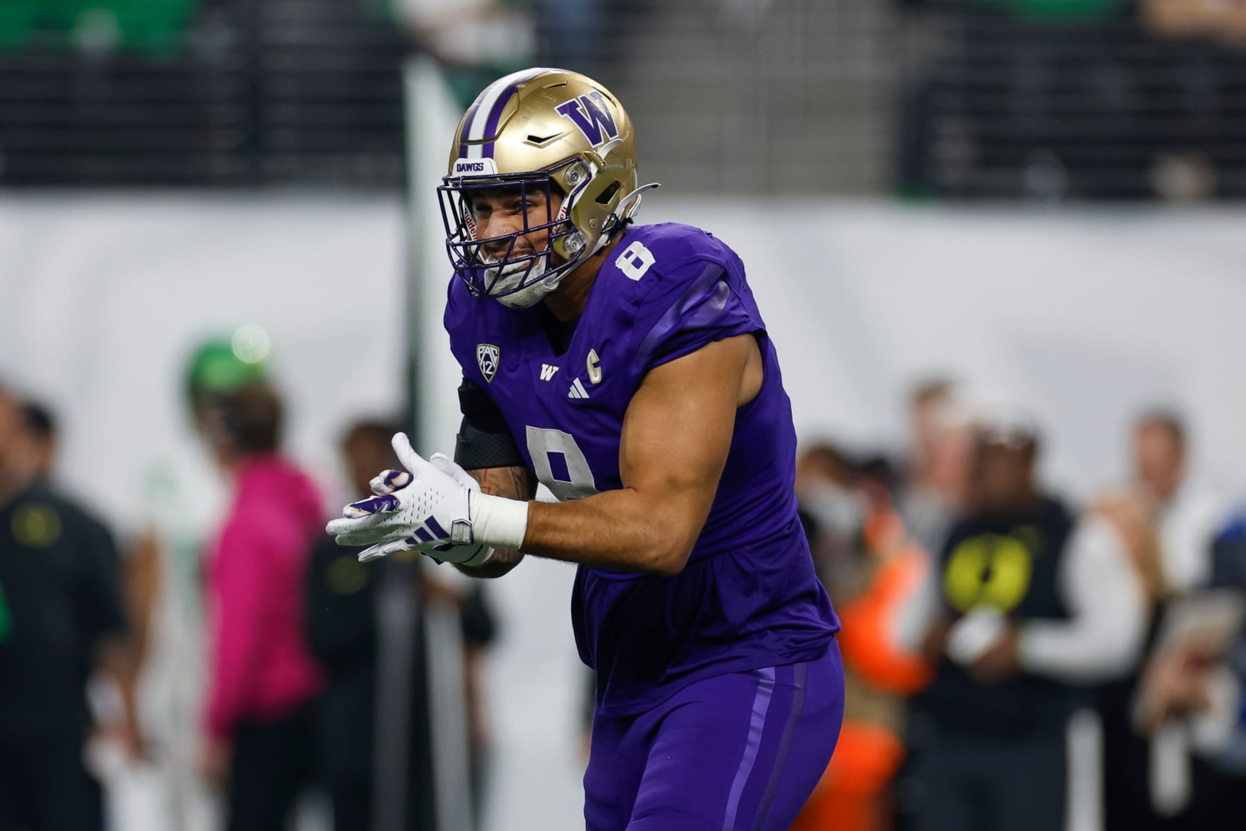 LAS VEGAS, NEVADA - DECEMBER 1: Bralen Trice #8 of the Washington Huskies celebrates in the first quarter during the Pac-12 Championship game against the Oregon Ducks at Allegiant Stadium on December 1, 2023 in Las Vegas, Nevada. (Photo by Brandon Sloter/Image Of Sport/Getty Images) LAS VEGAS, NEVADA - DECEMBER 1: Bralen Trice #8 of the Washington Huskies celebrates in the first quarter during the Pac-12 Championship game against the Oregon Ducks at Allegiant Stadium on December 1, 2023 in Las Vegas, Nevada. (Photo by Brandon Sloter/Image Of Sport/Getty Images)