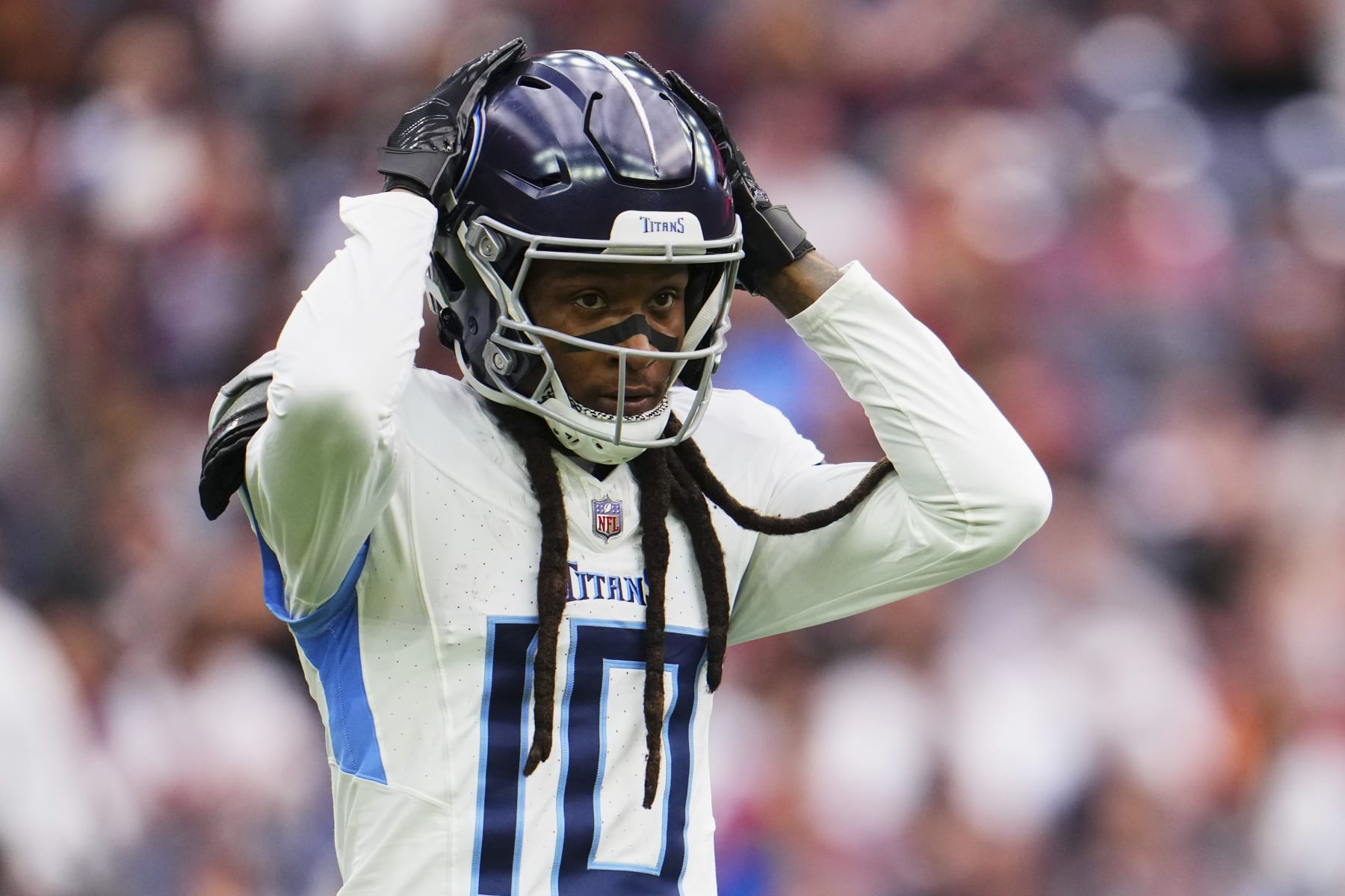 HOUSTON, TX - DECEMBER 31: DeAndre Hopkins #10 of the Tennessee Titans looks towards the sideline against the Houston Texans during the first half at NRG Stadium on December 31, 2023 in Houston, Texas. (Photo by Cooper Neill/Getty Images)