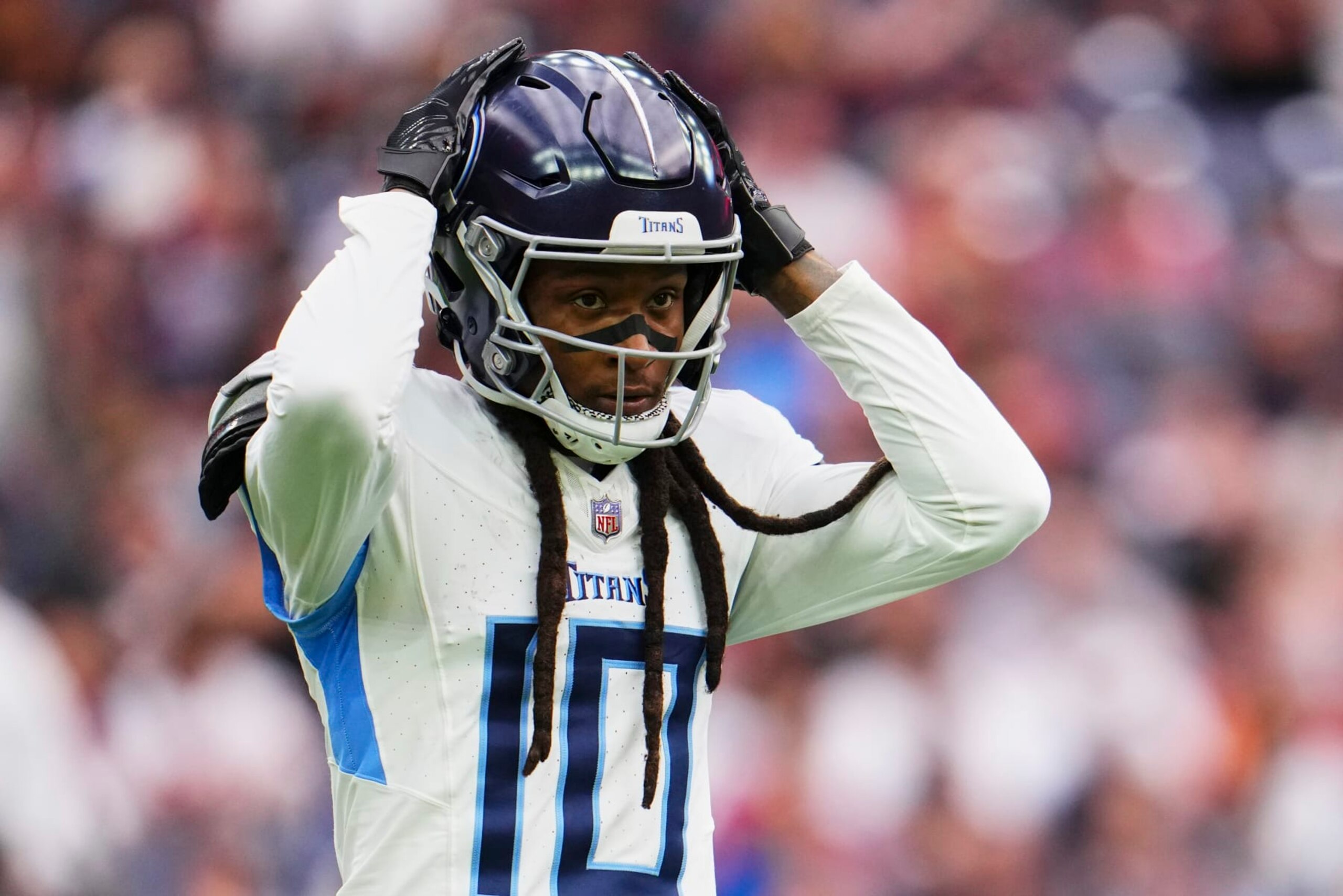 HOUSTON, TX - DECEMBER 31: DeAndre Hopkins #10 of the Tennessee Titans looks towards the sideline against the Houston Texans during the first half at NRG Stadium on December 31, 2023 in Houston, Texas. (Photo by Cooper Neill/Getty Images)