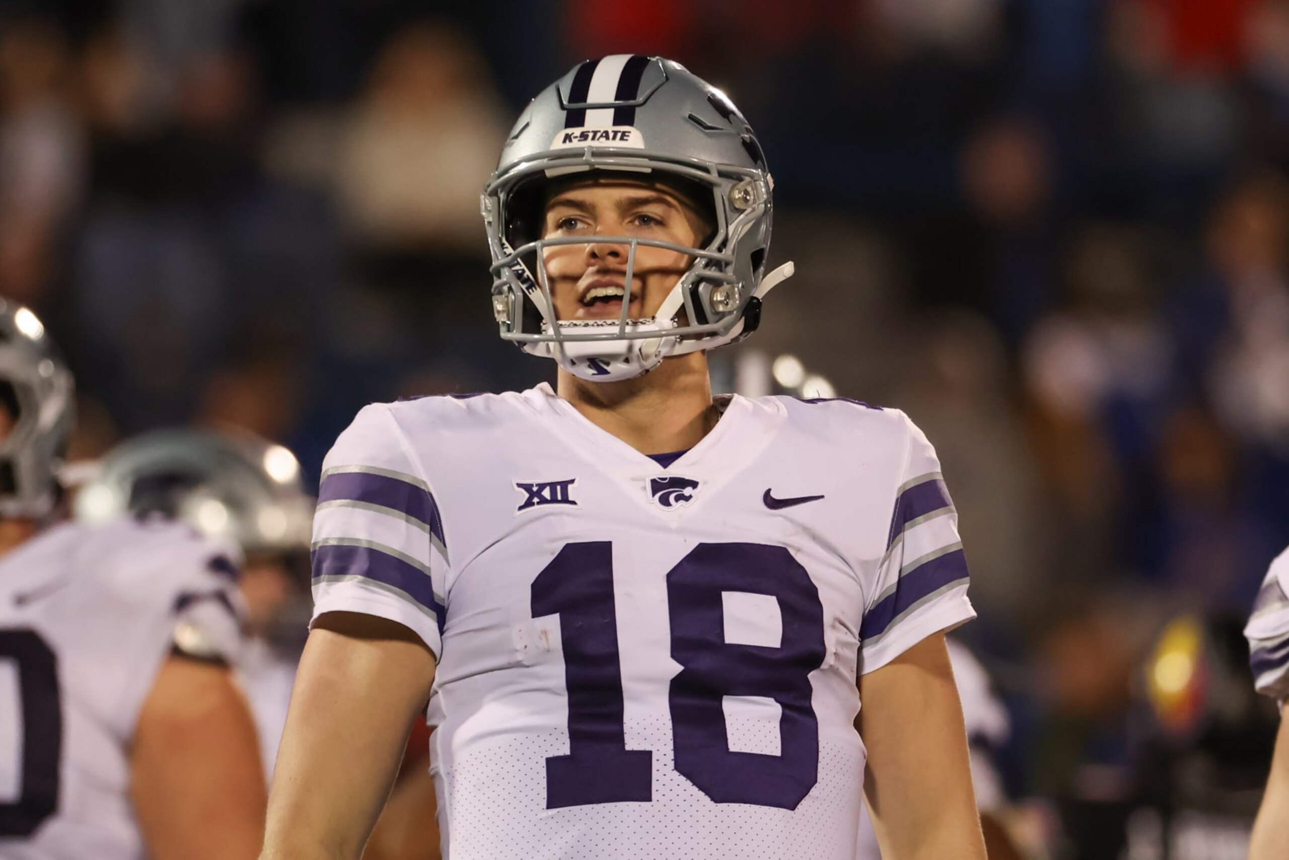 LAWRENCE, KS - NOVEMBER 18: Kansas State Wildcats quarterback Will Howard (18) smiles during a Big 12 football game between the Kansas State Wildcats and Kansas Jayhawks on Nov 18, 2023 at Memorial Stadium in Lawrence, KS. (Photo by Scott Winters/Icon Sportswire via Getty Images)