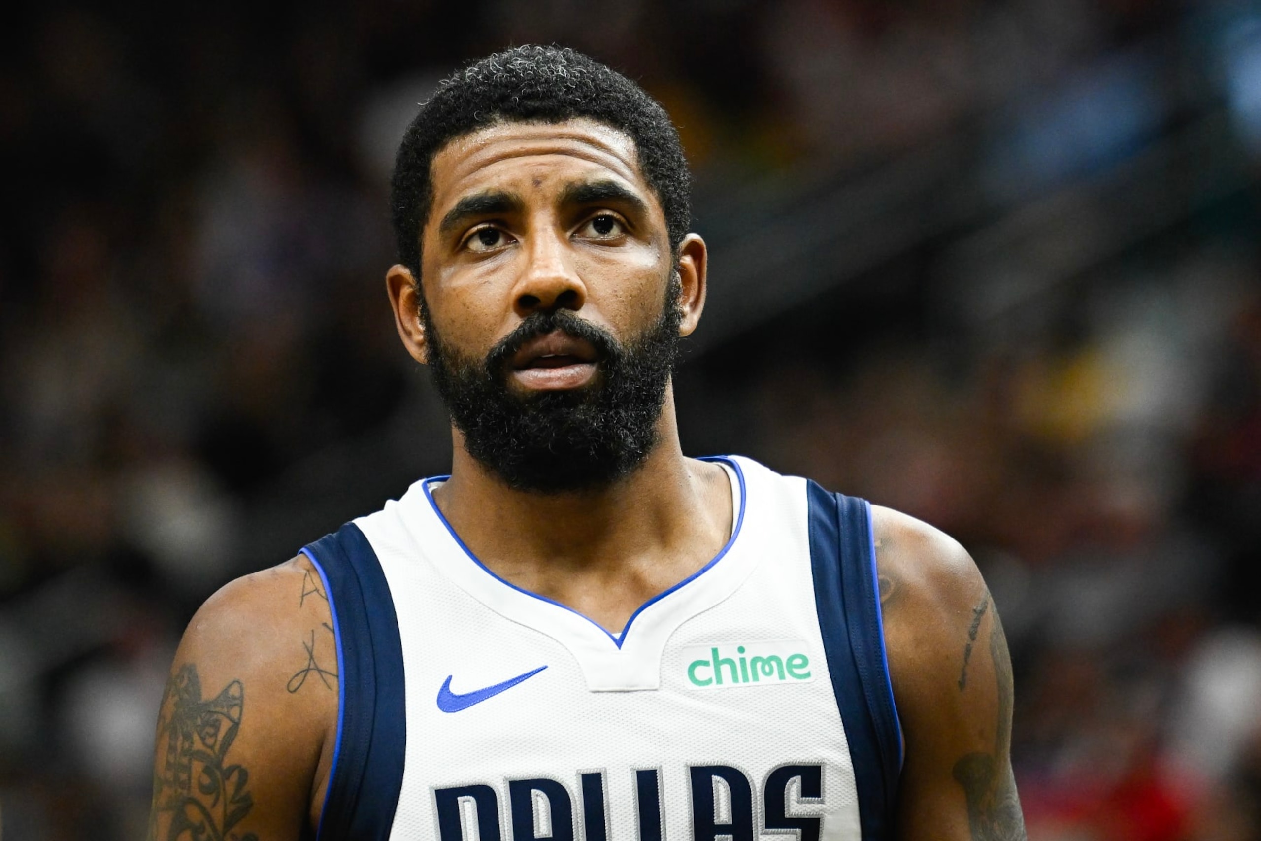 SALT LAKE CITY, UTAH - JANUARY 01: Kyrie Irving #11 of the Dallas Mavericks looks on during a game against the Utah Jazz at Delta Center on January 01, 2024 in Salt Lake City, Utah. NOTE TO USER: User expressly acknowledges and agrees that, by downloading and or using this photograph, User is consenting to the terms and conditions of the Getty Images License Agreement. (Photo by Alex Goodlett/Getty Images)