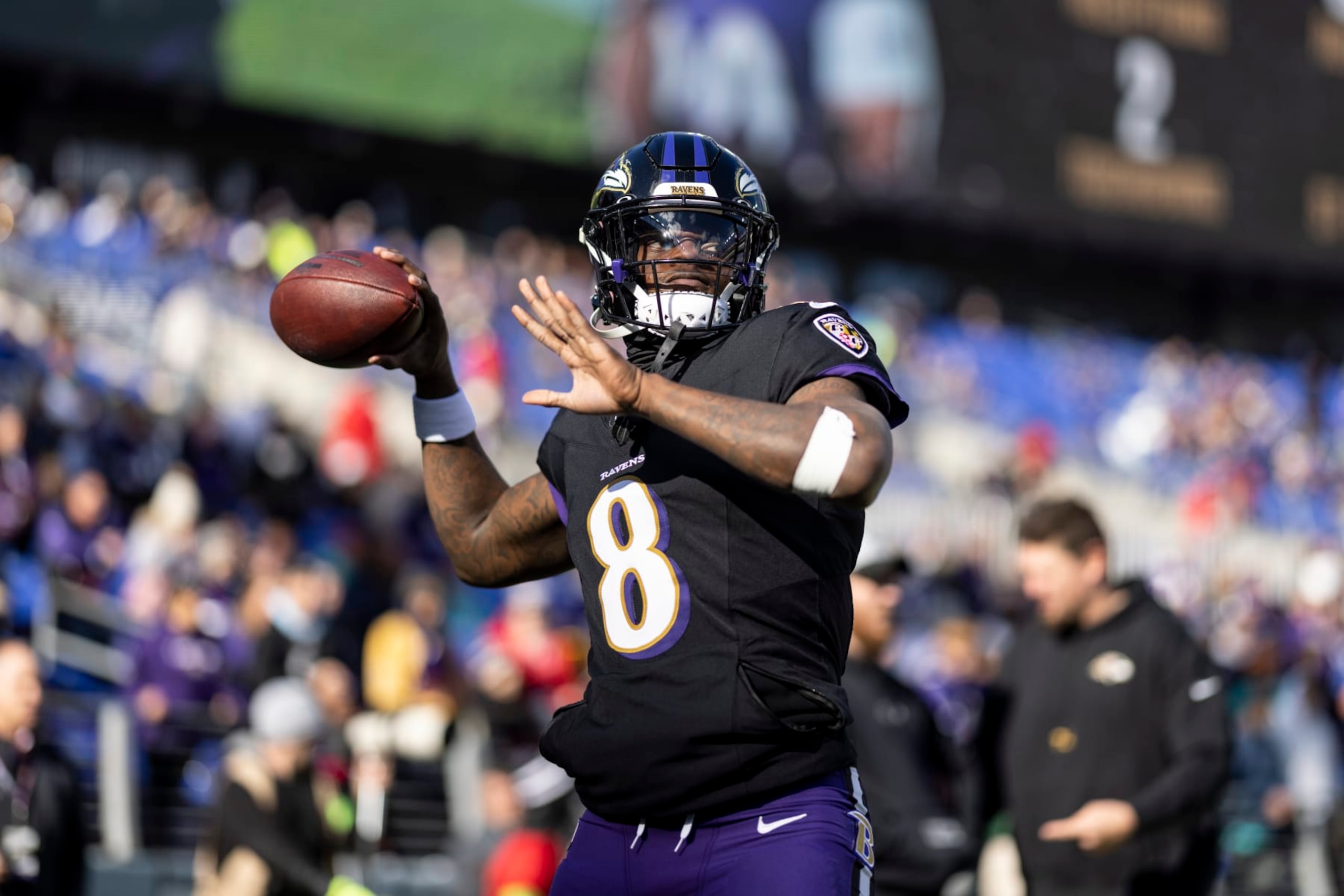 BALTIMORE, MARYLAND - DECEMBER 31: Lamar Jackson #8 of the Baltimore Ravens looks to pass as he warms up prior to an NFL football game between the Baltimore Ravens and the Miami Dolphins at M&T Bank Stadium on December 31, 2023 in Baltimore, Maryland. (Photo by Michael Owens/Getty Images)