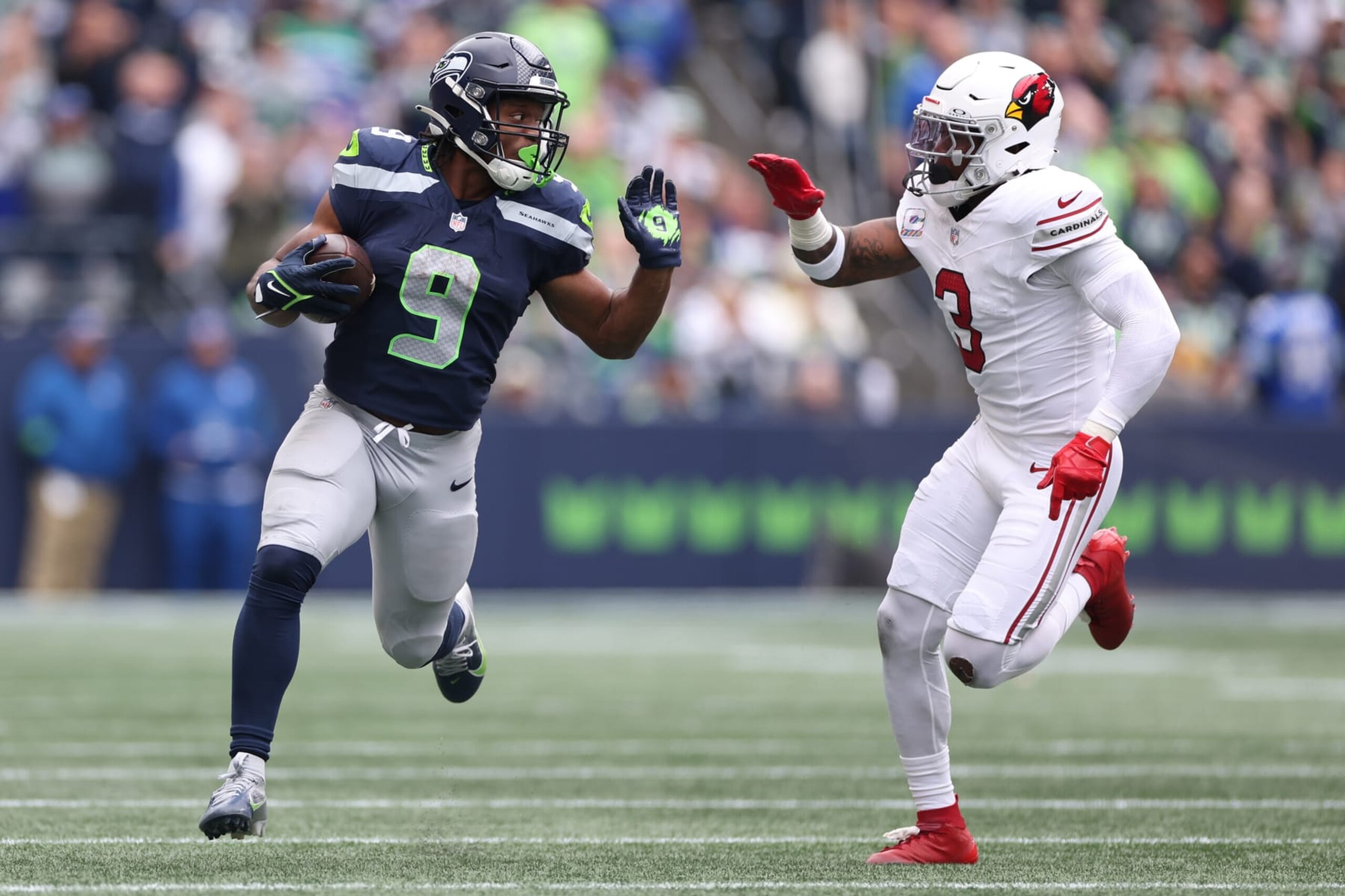 SEATTLE, WASHINGTON - OCTOBER 22: Kenneth Walker III #9 of the Seattle Seahawks runs with the ball in the first quarter of the game against the Arizona Cardinals at Lumen Field on October 22, 2023 in Seattle, Washington. (Photo by Steph Chambers/Getty Images)