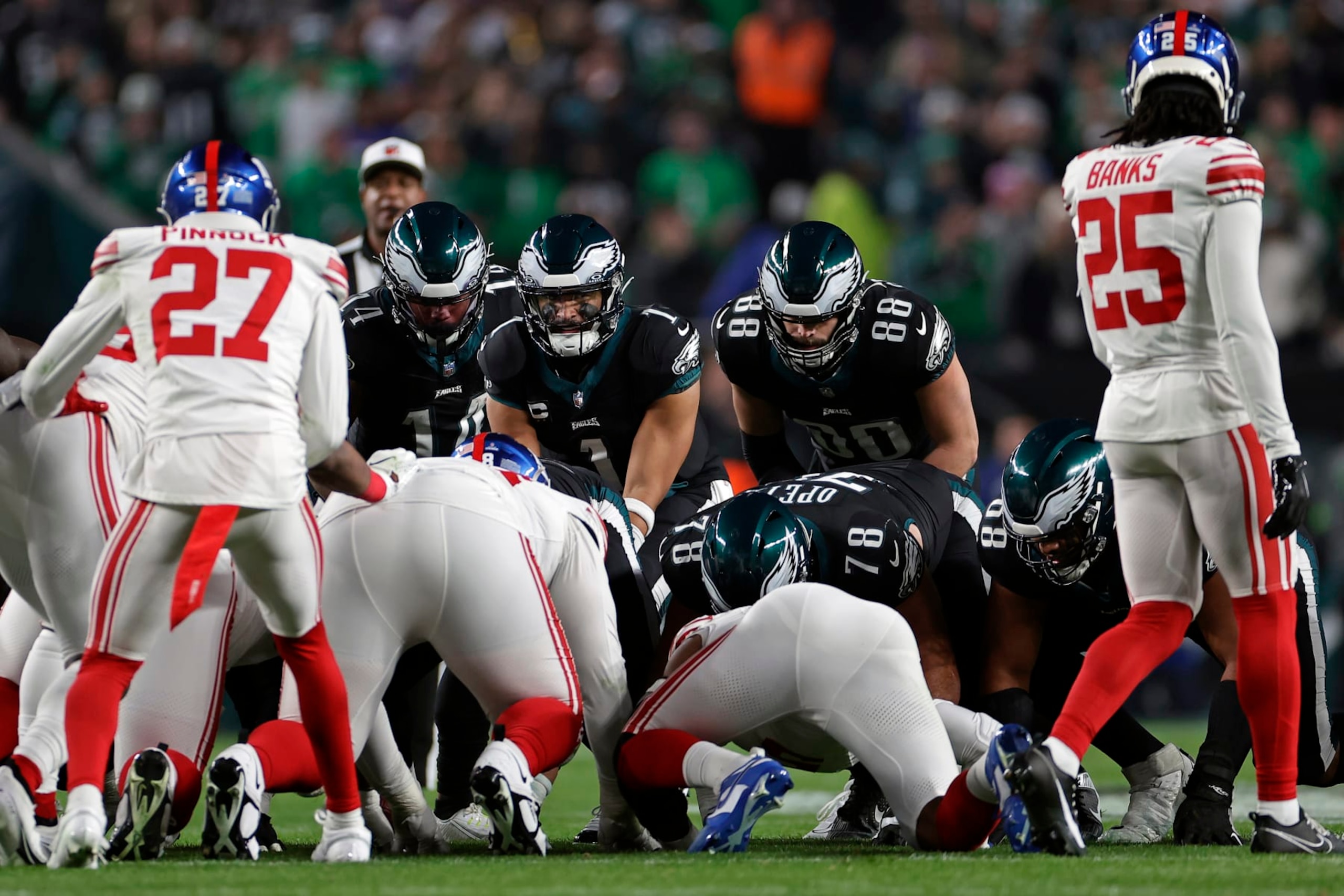 PHILADELPHIA, PENNSYLVANIA - DECEMBER 25: Jalen Hurts #1 of the Philadelphia Eagles at the line of scrimmage against the New York Giants at Lincoln Financial Field on December 25, 2023 in Philadelphia, Pennsylvania. (Photo by Adam Hunger/Getty Images)