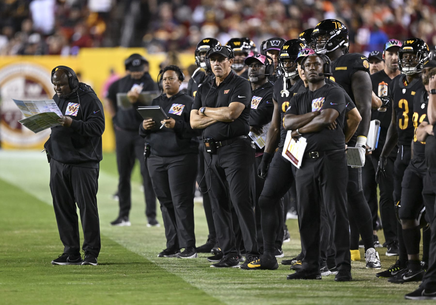 LANDOVER, MD -OCTOBER 5: Washington Commanders offensive coordinator Eric Bieniemy and Washington Commanders head coach Ron Rivera on the sidelines during the game against the Chicago Bears at FedEx Field on October 5, 2023. (Photo by Jonathan Newton/The Washington Post via Getty Images)