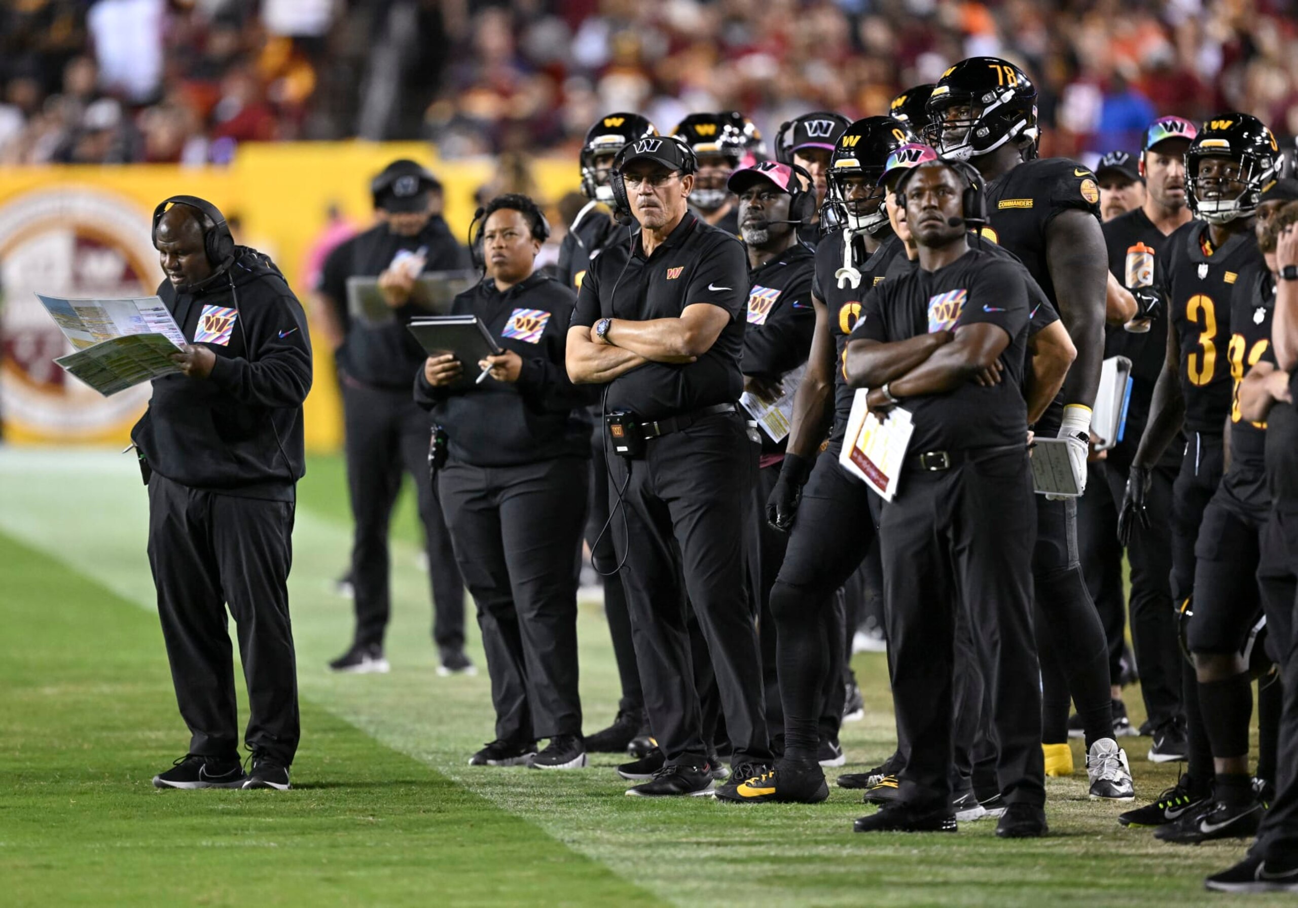 LANDOVER, MD -OCTOBER 5: Washington Commanders offensive coordinator Eric Bieniemy and Washington Commanders head coach Ron Rivera on the sidelines during the game against the Chicago Bears at FedEx Field on October 5, 2023. (Photo by Jonathan Newton/The Washington Post via Getty Images)