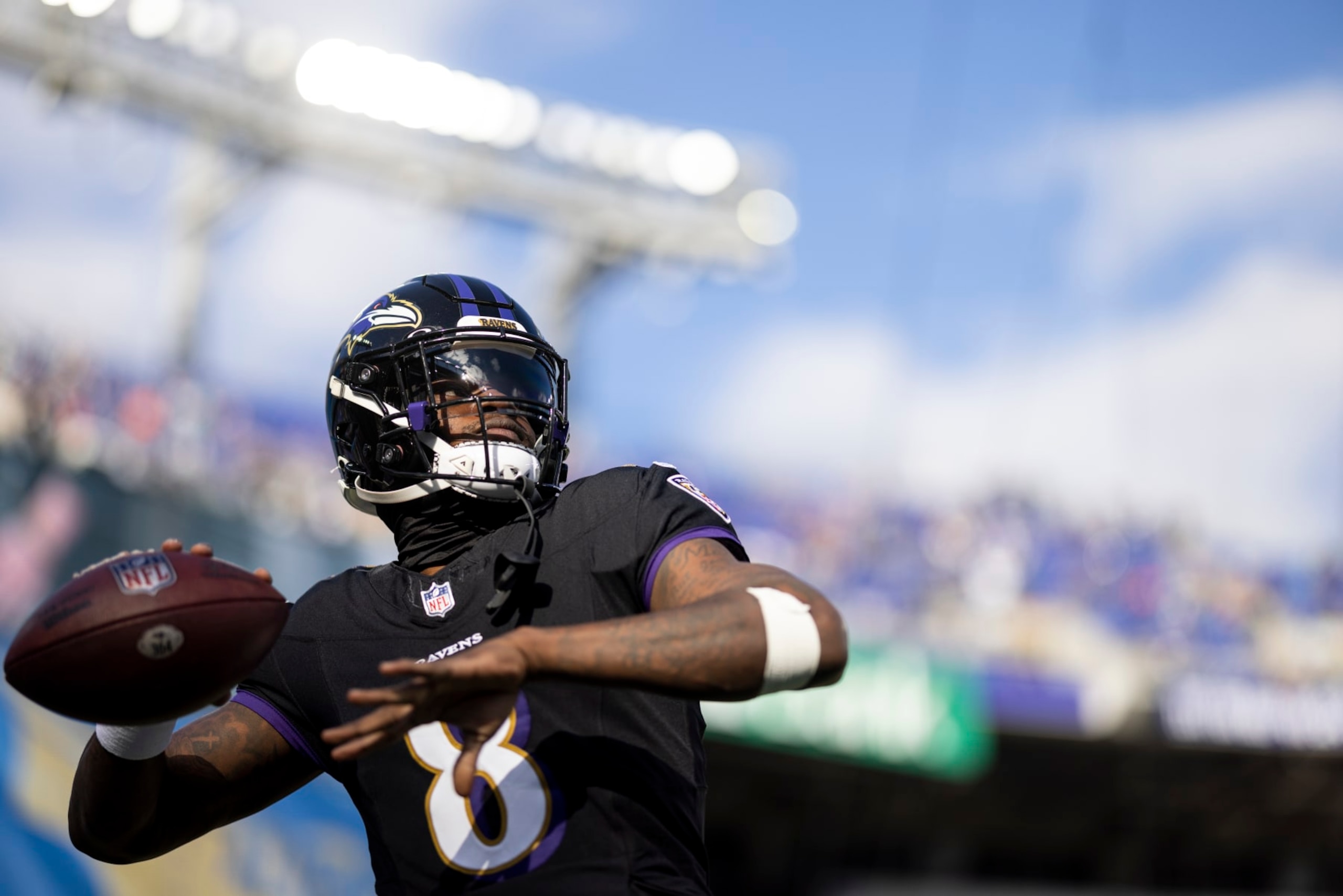 BALTIMORE, MARYLAND - DECEMBER 31: Lamar Jackson #8 of the Baltimore Ravens looks to pass as he warms up prior to an NFL football game between the Baltimore Ravens and the Miami Dolphins at M&T Bank Stadium on December 31, 2023 in Baltimore, Maryland. (Photo by Michael Owens/Getty Images)
