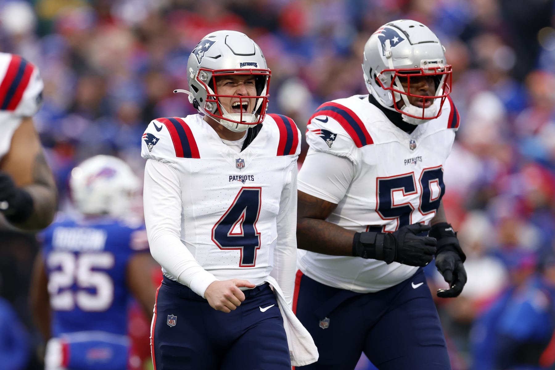 Orchard Park, NY - December 31: New England Patriots QB Bailey Zappe reacts to a sack in the first half. The Patriots lost to the Buffalo Bills, 27-21. (Photo by Danielle Parhizkaran/The Boston Globe via Getty Images)