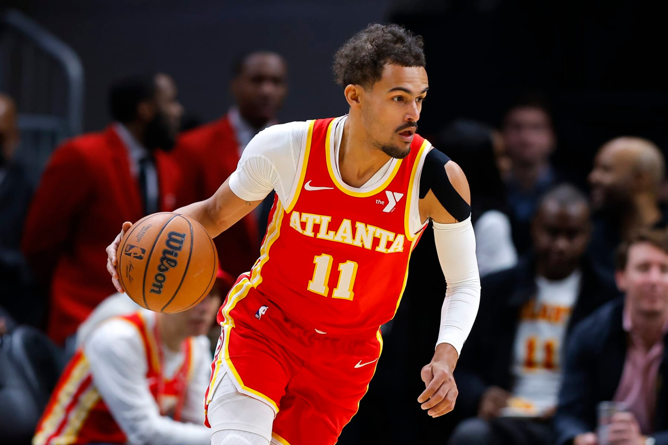 ATLANTA, GEORGIA - JANUARY 3: Trae Young #11 of the Atlanta Hawks drives to the basket during the first quarter against the Oklahoma City Thunder at State Farm Arena on January 3, 2024 in Atlanta, Georgia. NOTE TO USER: User expressly acknowledges and agrees that, by downloading and or using this photograph, User is consenting to the terms and conditions of the Getty Images License Agreement. (Photo by Todd Kirkland/Getty Images)