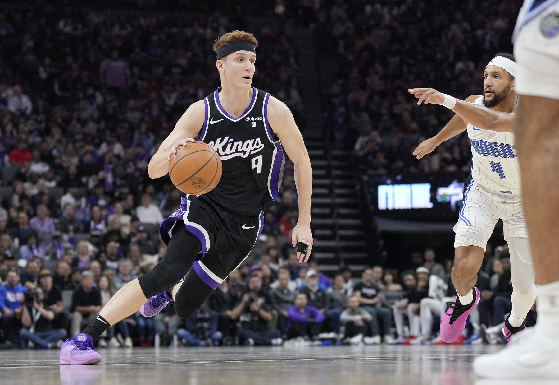 SACRAMENTO, CALIFORNIA - JANUARY 03: Kevin Huerter #9 of the Sacramento Kings dribbling the ball looks to drive towards the basket against the Orlando Magic during the first half of an NBA basketball game at Golden 1 Center on January 03, 2024 in Sacramento, California. NOTE TO USER: User expressly acknowledges and agrees that, by downloading and or using this photograph, User is consenting to the terms and conditions of the Getty Images License Agreement. (Photo by Thearon W. Henderson/Getty Images)