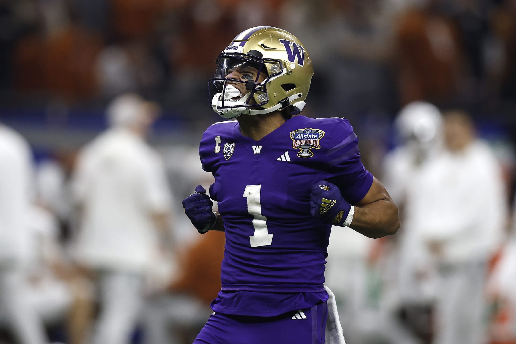 NEW ORLEANS, LOUISIANA - JANUARY 01: Rome Odunze #1 of the Washington Huskies reacts during the first half against the Texas Longhorns during the CFP Semifinal Allstate Sugar Bowl at Caesars Superdome on January 01, 2024 in New Orleans, Louisiana. (Photo by Sean Gardner/Getty Images)