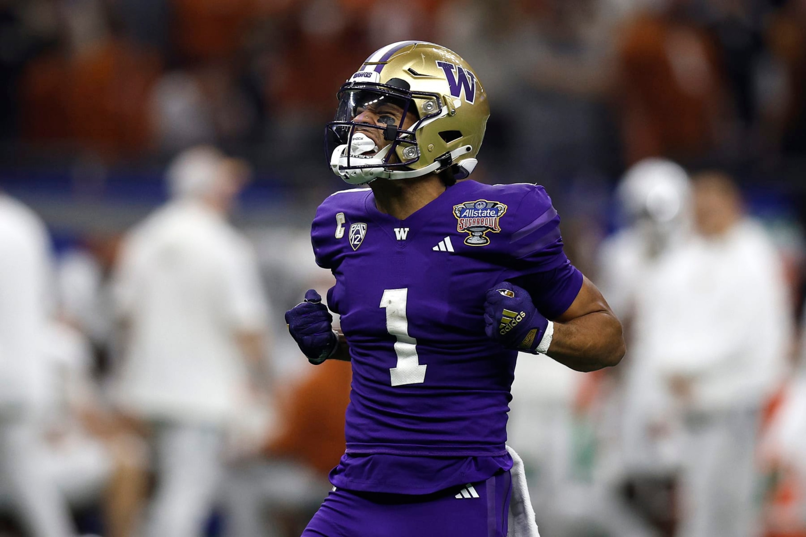 NEW ORLEANS, LOUISIANA - JANUARY 01: Rome Odunze #1 of the Washington Huskies reacts during the first half against the Texas Longhorns during the CFP Semifinal Allstate Sugar Bowl at Caesars Superdome on January 01, 2024 in New Orleans, Louisiana. (Photo by Sean Gardner/Getty Images) NEW ORLEANS, LOUISIANA - JANUARY 01: Rome Odunze #1 of the Washington Huskies reacts during the first half against the Texas Longhorns during the CFP Semifinal Allstate Sugar Bowl at Caesars Superdome on January 01, 2024 in New Orleans, Louisiana. (Photo by Sean Gardner/Getty Images)