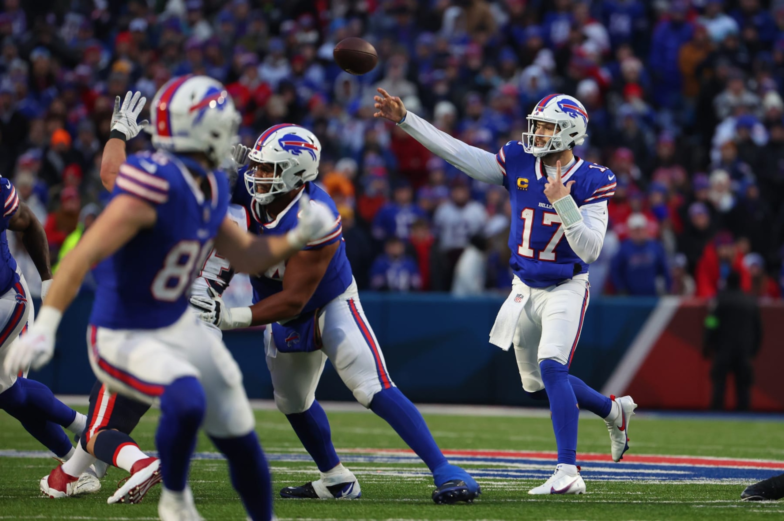 ORCHARD PARK, NEW YORK - DECEMBER 31: Josh Allen #17 of the Buffalo Bills throws a pass against the New England Patriots at Highmark Stadium on December 31, 2023 in Orchard Park, New York. (Photo by Timothy T Ludwig/Getty Images)