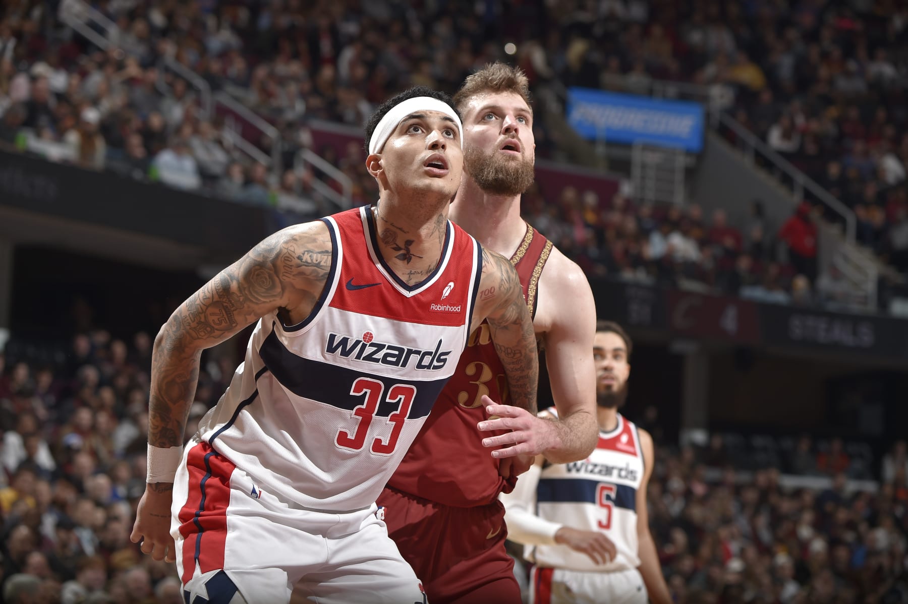 CLEVELAND, OH - JANUARY 3:  Kyle Kuzma #33 of the Washington Wizards boxes out during the game  on January 3, 2024 at Rocket Mortgage FieldHouse in Cleveland, Ohio. NOTE TO USER: User expressly acknowledges and agrees that, by downloading and/or using this Photograph, user is consenting to the terms and conditions of the Getty Images License Agreement. Mandatory Copyright Notice: Copyright 2024 NBAE (Photo by David Liam Kyle/NBAE via Getty Images)
