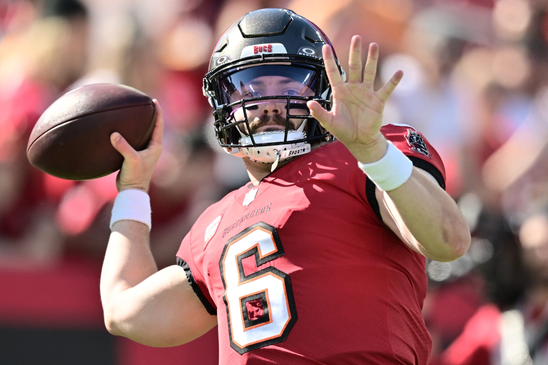TAMPA, FLORIDA - DECEMBER 31: Baker Mayfield #6 of the Tampa Bay Buccaneers warms up before the game against the New Orleans Saints at Raymond James Stadium on December 31, 2023 in Tampa, Florida. (Photo by Julio Aguilar/Getty Images)