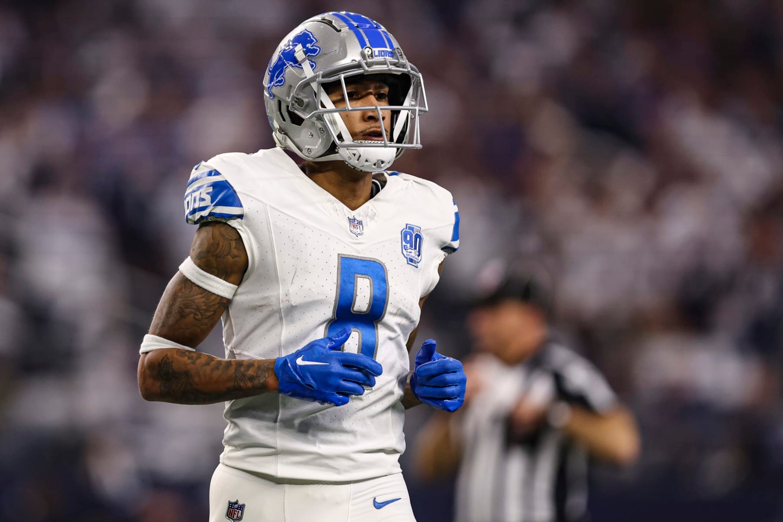 ARLINGTON, TX - DECEMBER 30: Josh Reynolds #8 of the Detroit Lions looks on from the field during an NFL football game against the Dallas Cowboys at AT&T Stadium on December 30, 2023 in Arlington, Texas. (Photo by Perry Knotts/Getty Images)