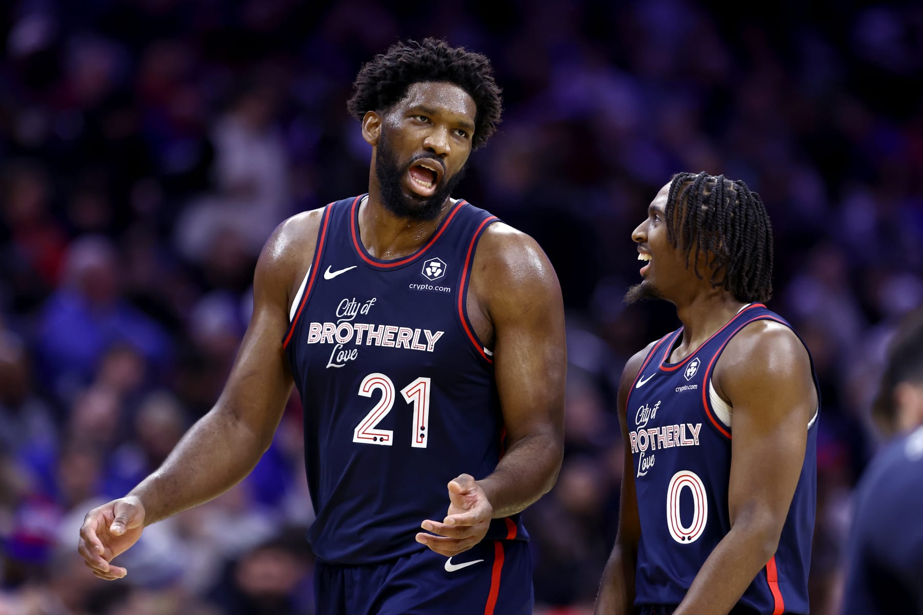 PHILADELPHIA, PENNSYLVANIA - DECEMBER 20: Joel Embiid #21 and Tyrese Maxey #0 of the Philadelphia 76ers speak during the second quarter against the Minnesota Timberwolves at the Wells Fargo Center on December 20, 2023 in Philadelphia, Pennsylvania. NOTE TO USER: User expressly acknowledges and agrees that, by downloading and or using this photograph, User is consenting to the terms and conditions of the Getty Images License Agreement. (Photo by Tim Nwachukwu/Getty Images)