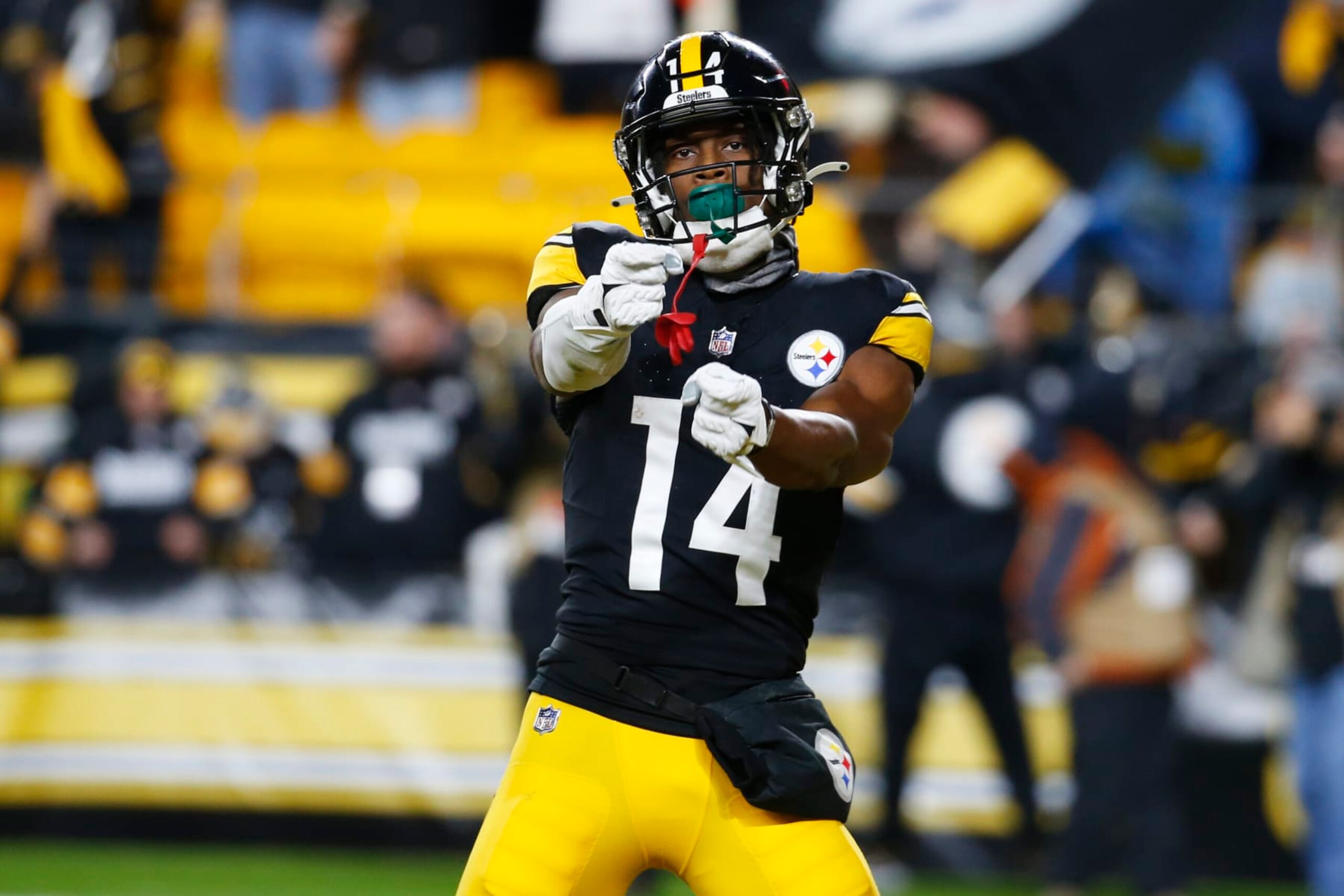 PITTSBURGH, PENNSYLVANIA - DECEMBER 23: George Pickens #14 of the Pittsburgh Steelers celebrates after scoring a touchdown during the thrid quarter of a game against the Cincinnati Bengals at Acrisure Stadium on December 23, 2023 in Pittsburgh, Pennsylvania. (Photo by Justin K. Aller/Getty Images)