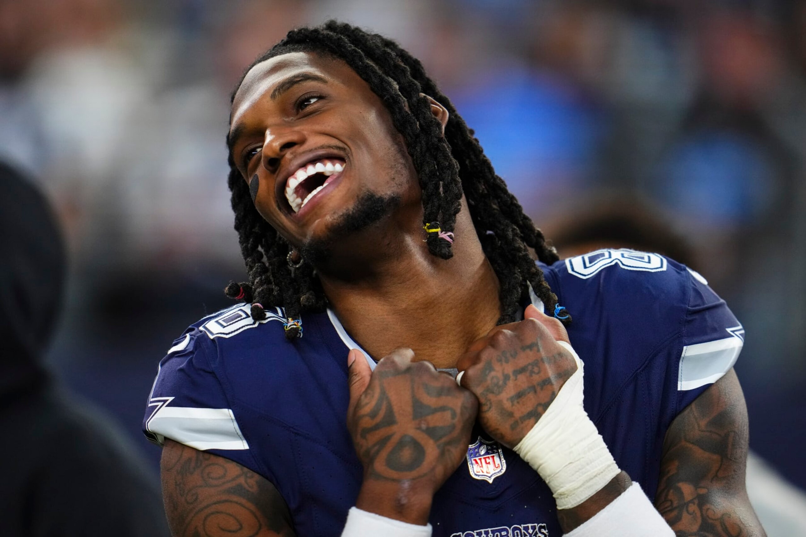ARLINGTON, TX - DECEMBER 30: CeeDee Lamb #88 of the Dallas Cowboys looks on from the sideline prior to an NFL football game against the Detroit Lions at AT&T Stadium on December 30, 2023 in Arlington, Texas. (Photo by Cooper Neill/Getty Images)