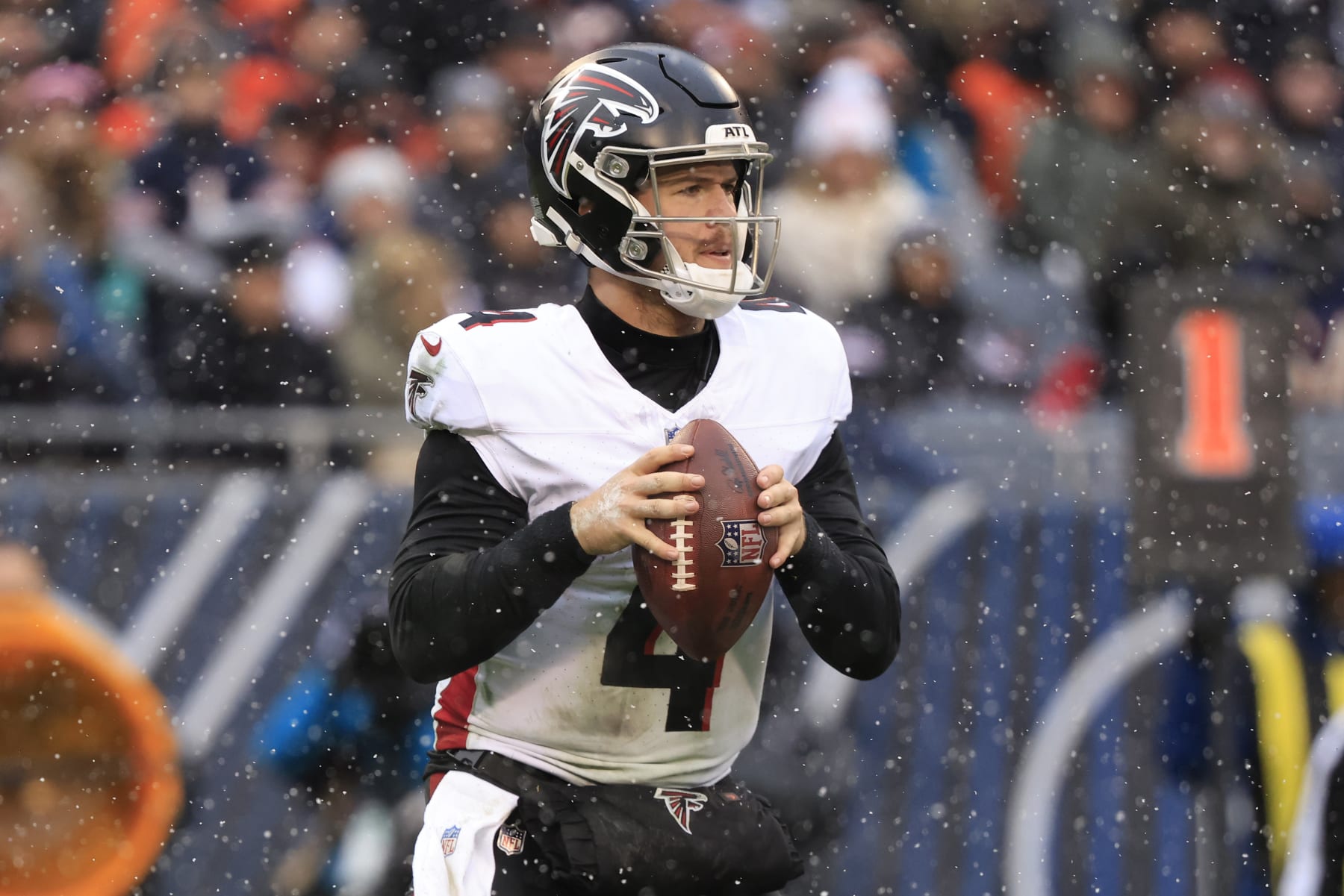 CHICAGO, ILLINOIS - DECEMBER 31: Taylor Heinicke #4 of the Atlanta Falcons looks to pass in the game against the Chicago Bears at Soldier Field on December 31, 2023 in Chicago, Illinois. (Photo by Justin Casterline/Getty Images)