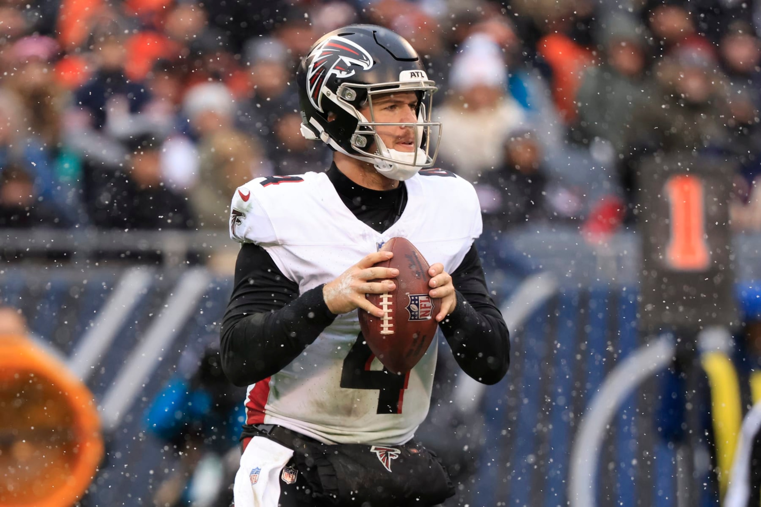 CHICAGO, ILLINOIS - DECEMBER 31: Taylor Heinicke #4 of the Atlanta Falcons looks to pass in the game against the Chicago Bears at Soldier Field on December 31, 2023 in Chicago, Illinois. (Photo by Justin Casterline/Getty Images)