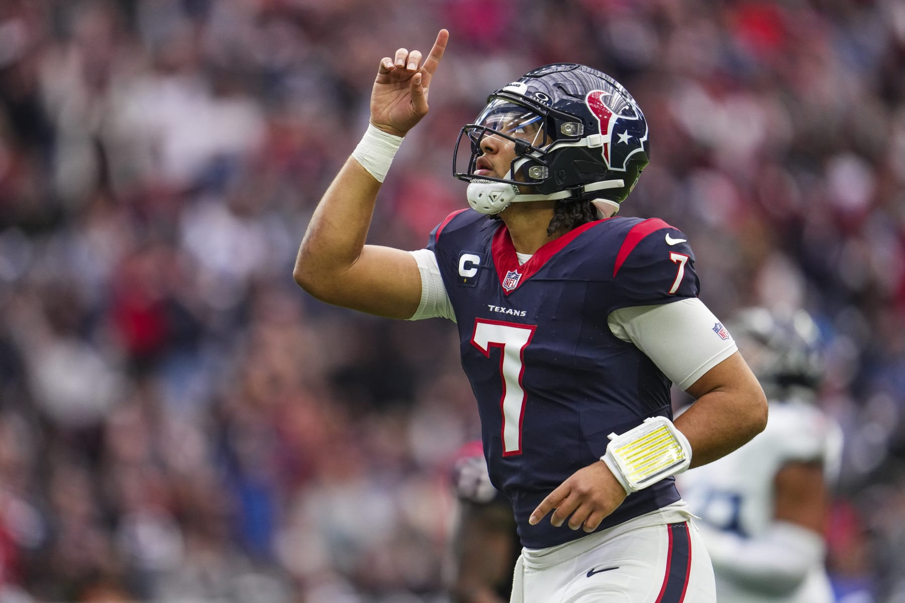 HOUSTON, TX - DECEMBER 31: C.J. Stroud #7 of the Houston Texans celebrates during an NFL football game against the Tennessee Titans at NRG Stadium on December 31, 2023 in Houston, Texas. (Photo by Cooper Neill/Getty Images)
