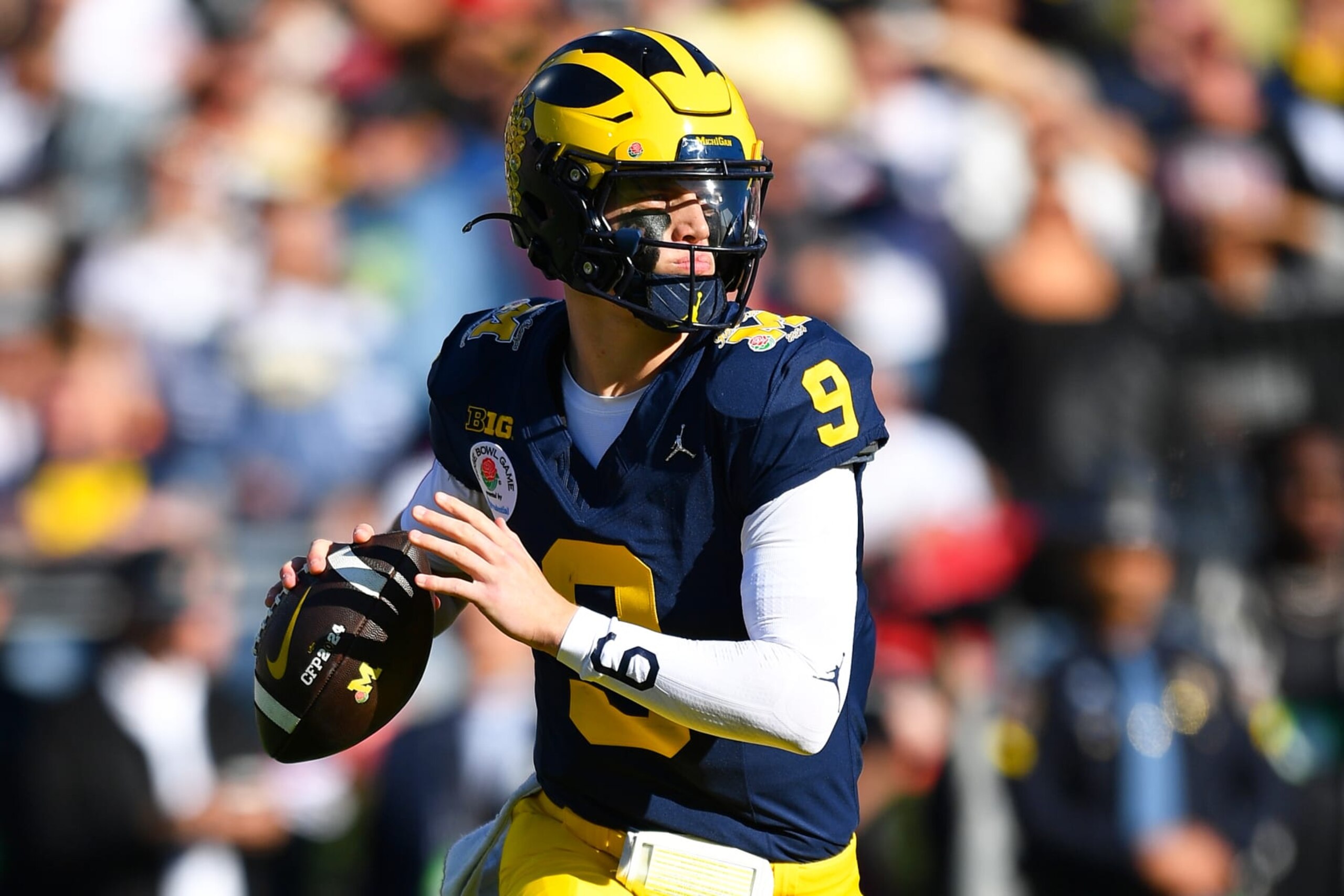 PASADENA, CA - JANUARY 01: QB J.J. McCarthy (9) of the Michigan Wolverines looks to pass during the Alabama Crimson Tide game versus the Michigan Wolverines CFP Semifinal at the Rose Bowl Game on January, 1, 2024, at the Rose Bowl Stadium in Pasadena, CA. (Photo by Brian Rothmuller/Icon Sportswire via Getty Images)