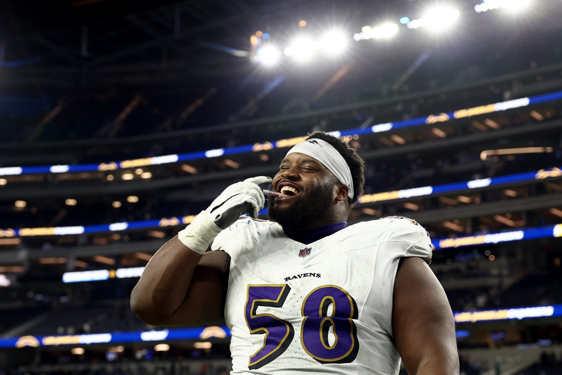 INGLEWOOD, CALIFORNIA - NOVEMBER 26: Michael Pierce #58 of the Baltimore Ravens celebrates after defeating the Los Angeles Chargers in the game at SoFi Stadium on November 26, 2023 in Inglewood, California. (Photo by Katelyn Mulcahy/Getty Images)