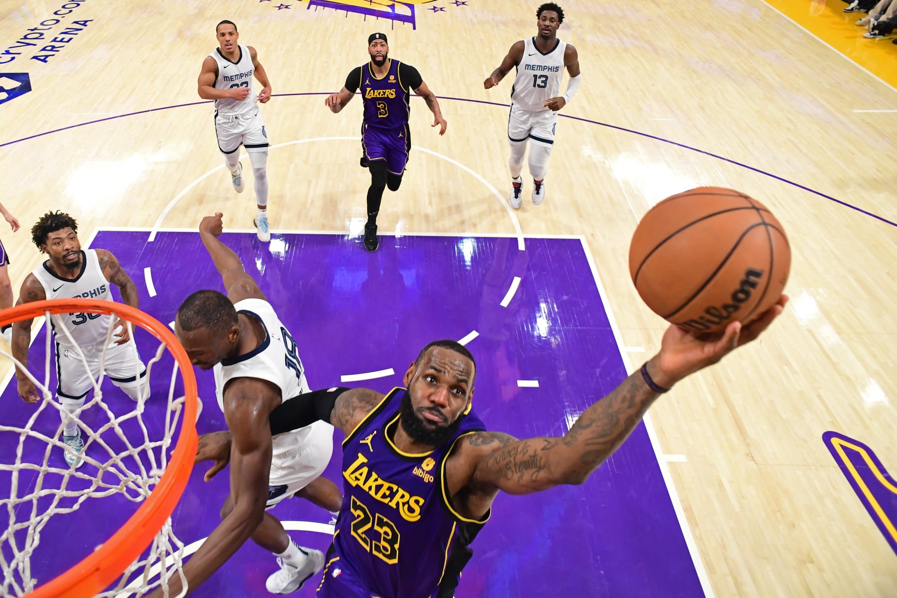 LOS ANGELES, CA - JANUARY 5: LeBron James #23 of the Los Angeles Lakers rebounds during the game against the Memphis Grizzlies on January 5, 2024 at Crypto.Com Arena in Los Angeles, California. NOTE TO USER: User expressly acknowledges and agrees that, by downloading and/or using this Photograph, user is consenting to the terms and conditions of the Getty Images License Agreement. Mandatory Copyright Notice: Copyright 2024 NBAE (Photo by Adam Pantozzi/NBAE via Getty Images)