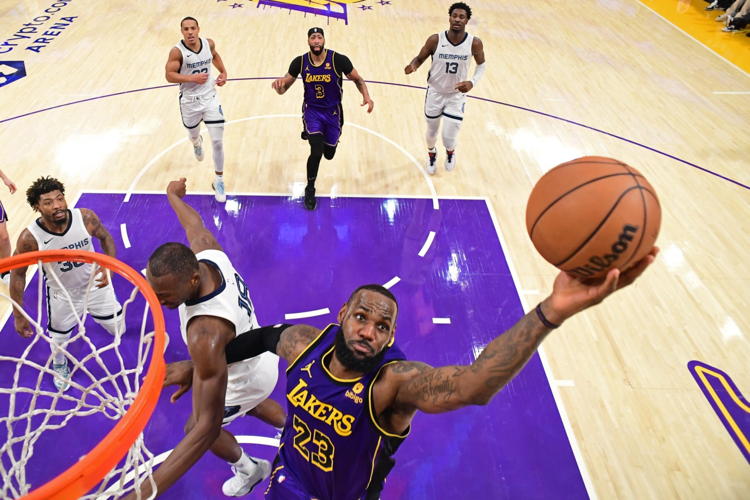 LOS ANGELES, CA - JANUARY 5: LeBron James #23 of the Los Angeles Lakers rebounds during the game against the Memphis Grizzlies on January 5, 2024 at Crypto.Com Arena in Los Angeles, California. NOTE TO USER: User expressly acknowledges and agrees that, by downloading and/or using this Photograph, user is consenting to the terms and conditions of the Getty Images License Agreement. Mandatory Copyright Notice: Copyright 2024 NBAE (Photo by Adam Pantozzi/NBAE via Getty Images)