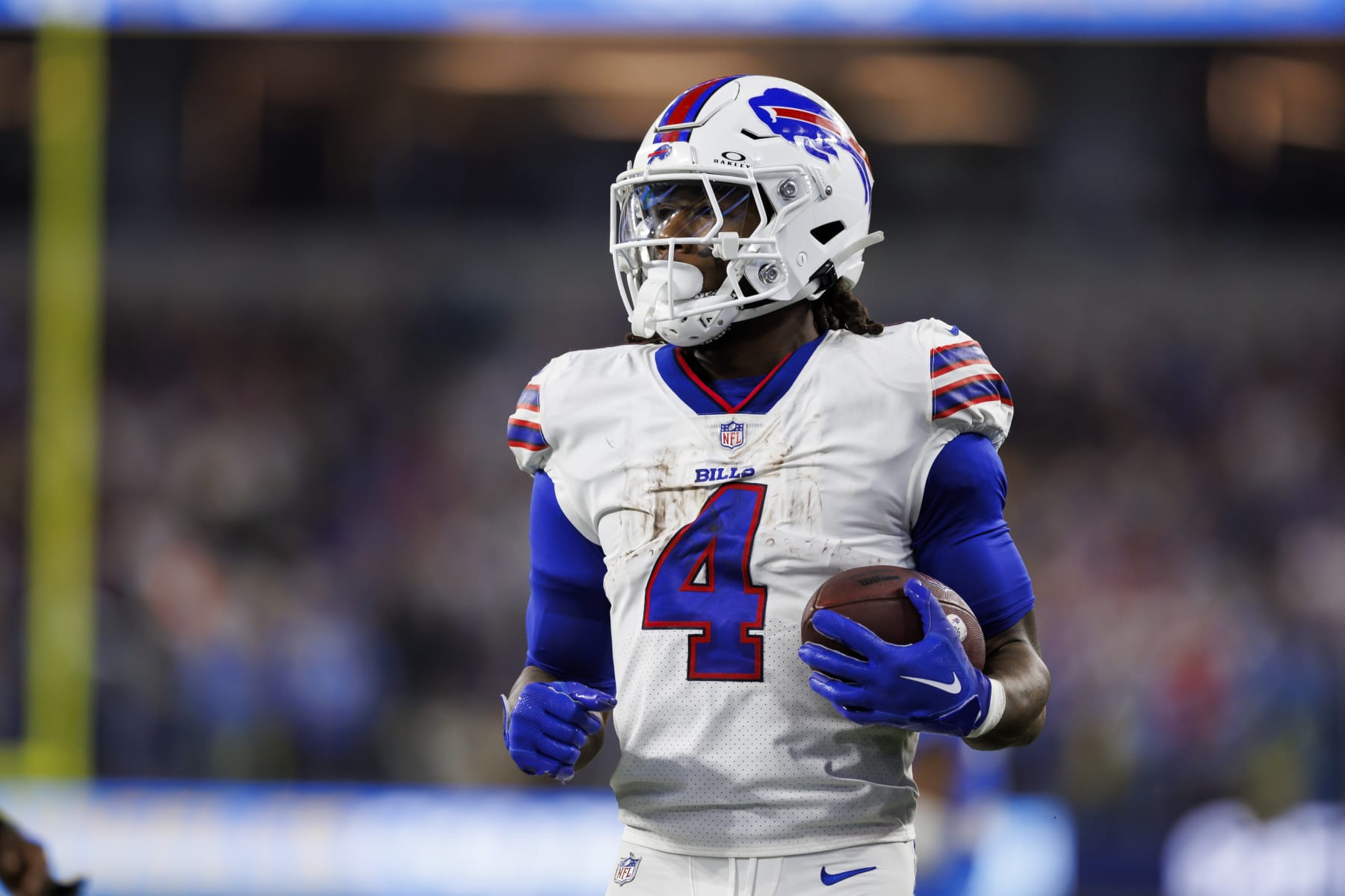 INGLEWOOD, CA - DECEMBER 23: James Cook #4 of the Buffalo Bills carries the ball on a run play during an NFL football game against the Los Angeles Chargers at SoFi Stadium on December 23, 2023 in Inglewood, California. (Photo by Ryan Kang/Getty Images)