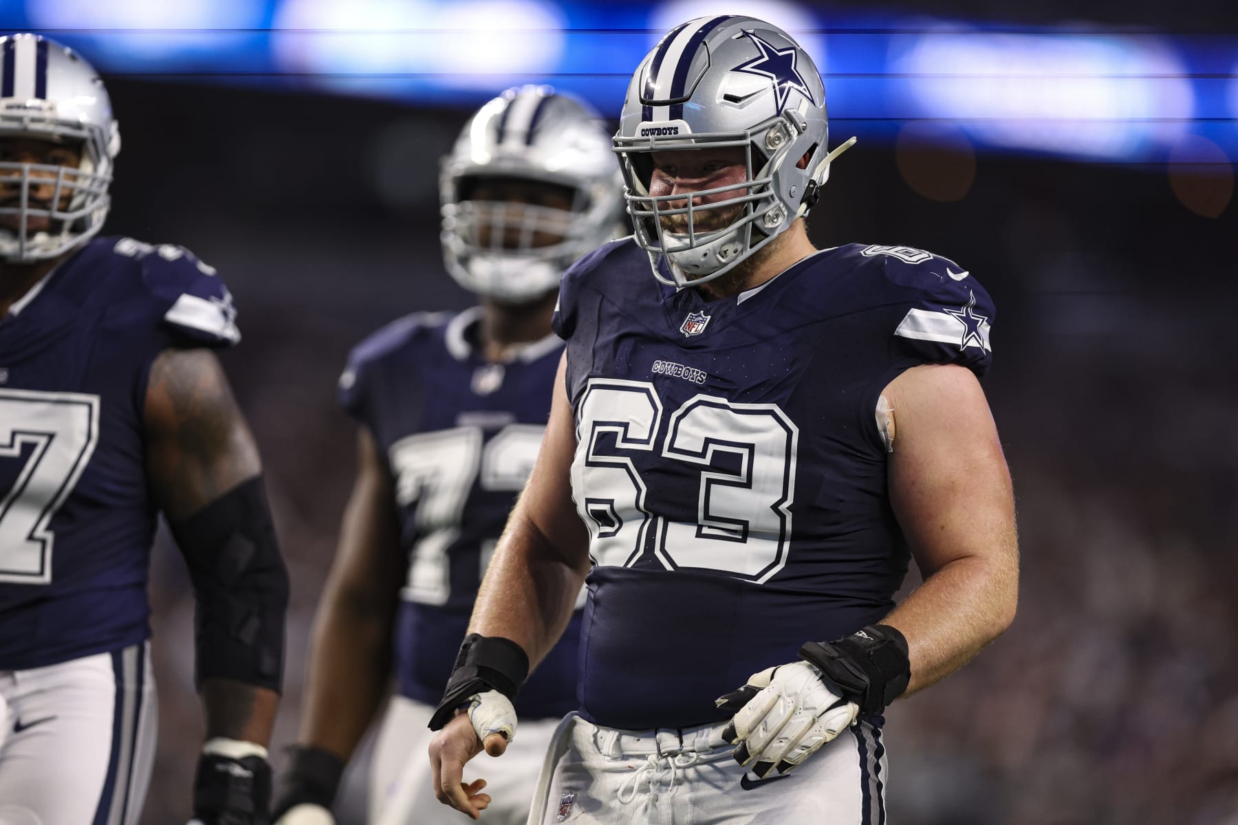 ARLINGTON, TX - DECEMBER 30: Tyler Biadasz #63 of the Dallas Cowboys looks on from the field during an NFL football game against the Detroit Lions at AT&T Stadium on December 30, 2023 in Arlington, Texas. (Photo by Perry Knotts/Getty Images)