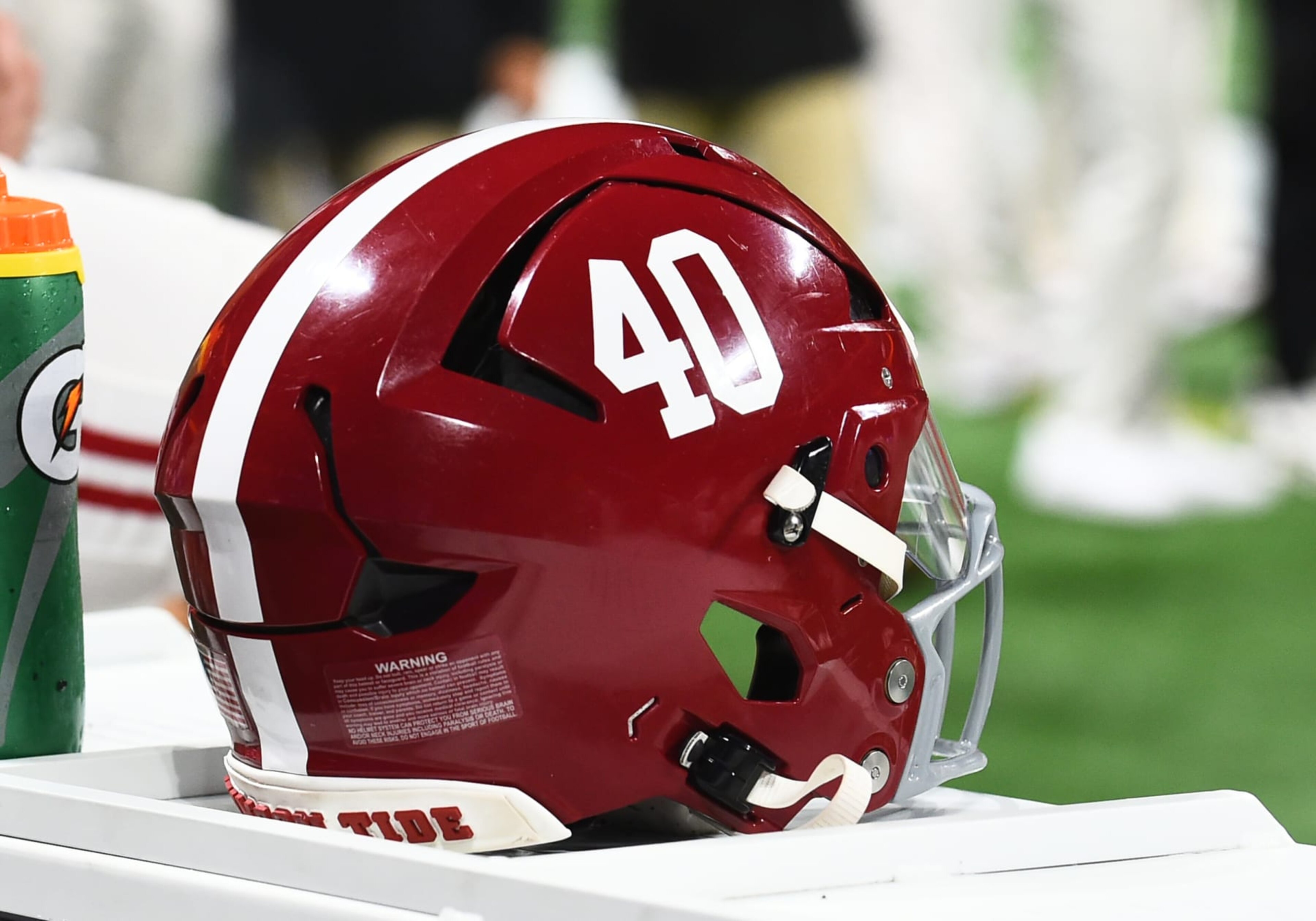 ATLANTA, GA - DECEMBER 02: An Alabama Crimson Tide football helmet sits on the sideline during the SEC Championship Game between the Georgia Bulldogs and the Alabama Crimson Tide on December 02, 2023, at Mercedes-Benz Stadium in Atlanta, GA. (Photo by Jeffrey Vest/Icon Sportswire via Getty Images) ATLANTA, GA - DECEMBER 02: An Alabama Crimson Tide football helmet sits on the sideline during the SEC Championship Game between the Georgia Bulldogs and the Alabama Crimson Tide on December 02, 2023, at Mercedes-Benz Stadium in Atlanta, GA. (Photo by Jeffrey Vest/Icon Sportswire via Getty Images)