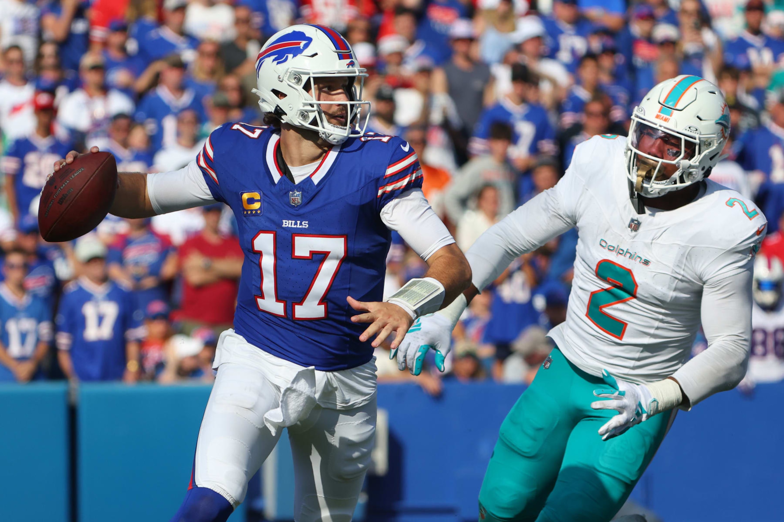 ORCHARD PARK, NEW YORK - OCTOBER 01: Josh Allen #17 of the Buffalo Bills looks to pass as Bradley Chubb #2 of the Miami Dolphins pressures during the fourth quarter at Highmark Stadium on October 01, 2023 in Orchard Park, New York. (Photo by Timothy T Ludwig/Getty Images) ORCHARD PARK, NEW YORK - OCTOBER 01: Josh Allen #17 of the Buffalo Bills looks to pass as Bradley Chubb #2 of the Miami Dolphins pressures during the fourth quarter at Highmark Stadium on October 01, 2023 in Orchard Park, New York. (Photo by Timothy T Ludwig/Getty Images)