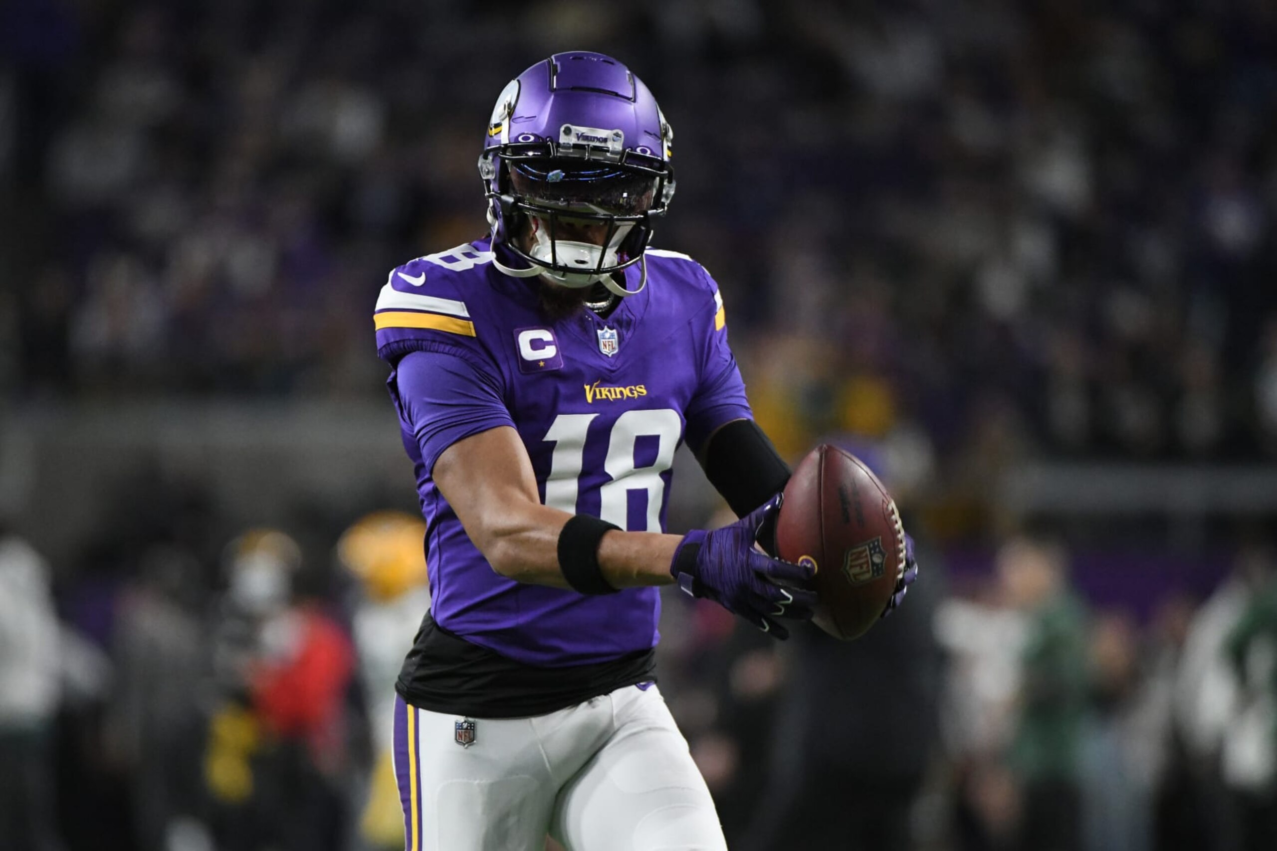 MINNEAPOLIS, MINNESOTA - DECEMBER 31: Justin Jefferson #18 of the Minnesota Vikings warms up prior to a game against the Green Bay Packers at U.S. Bank Stadium on December 31, 2023 in Minneapolis, Minnesota. (Photo by Stephen Maturen/Getty Images)