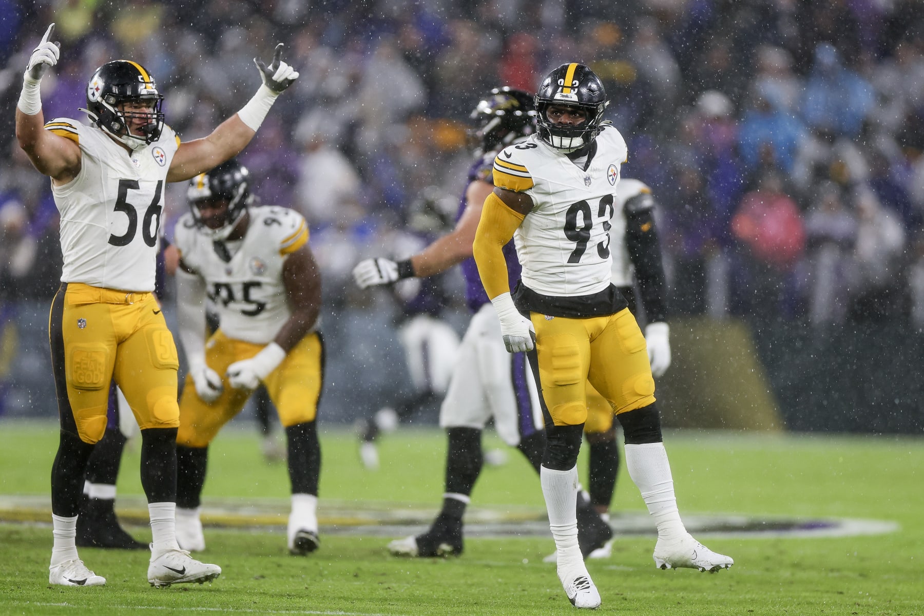 BALTIMORE, MARYLAND - JANUARY 06: Mark Robinson #93 of the Pittsburgh Steelers and Alex Highsmith #56 celebrate after a sack in the second quarter of a game against the Baltimore Ravens at M&T Bank Stadium on January 06, 2024 in Baltimore, Maryland. (Photo by Rob Carr/Getty Images)