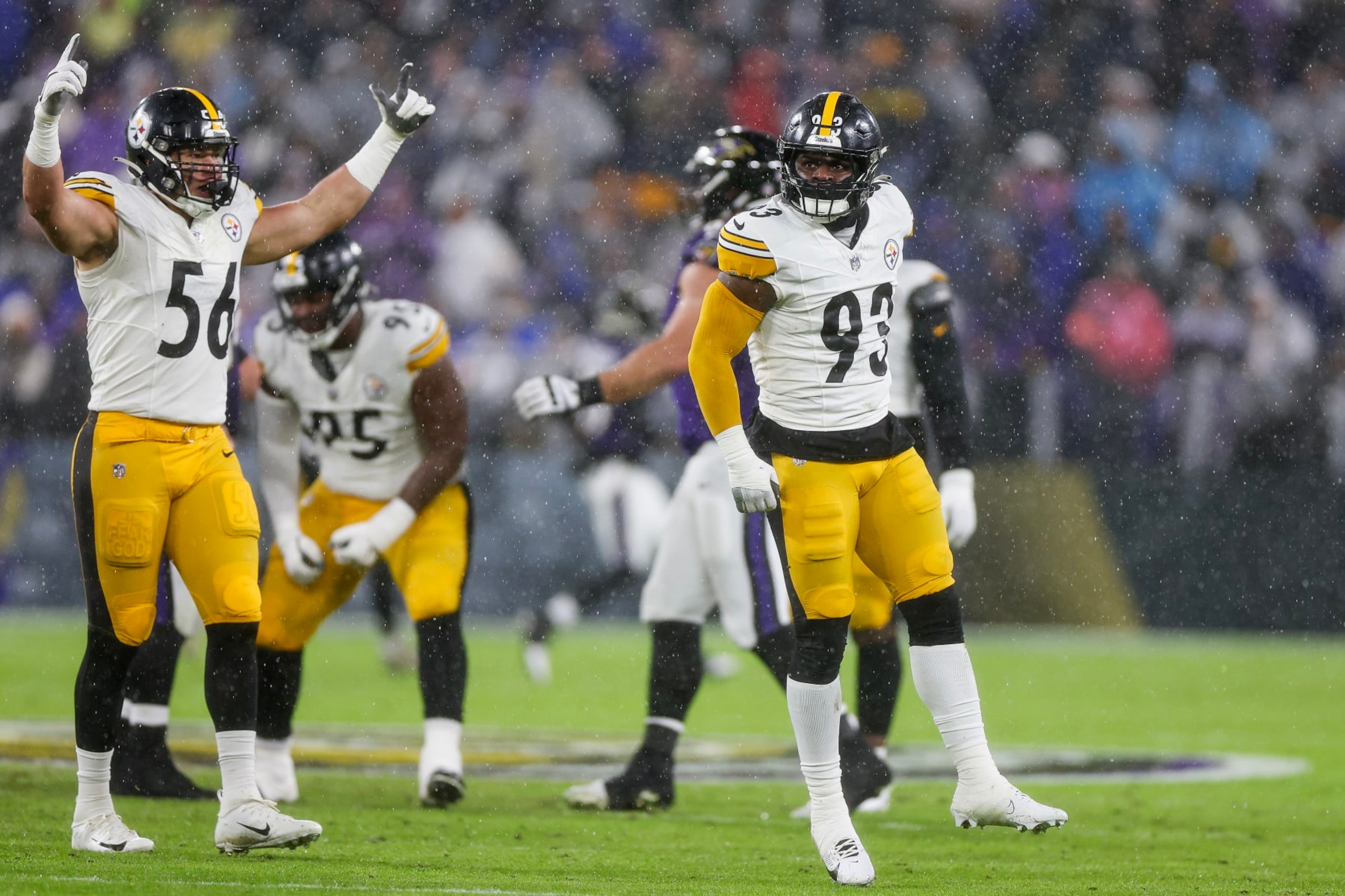 BALTIMORE, MARYLAND - JANUARY 06: Mark Robinson #93 of the Pittsburgh Steelers and Alex Highsmith #56 celebrate after a sack in the second quarter of a game against the Baltimore Ravens at M&T Bank Stadium on January 06, 2024 in Baltimore, Maryland. (Photo by Rob Carr/Getty Images)